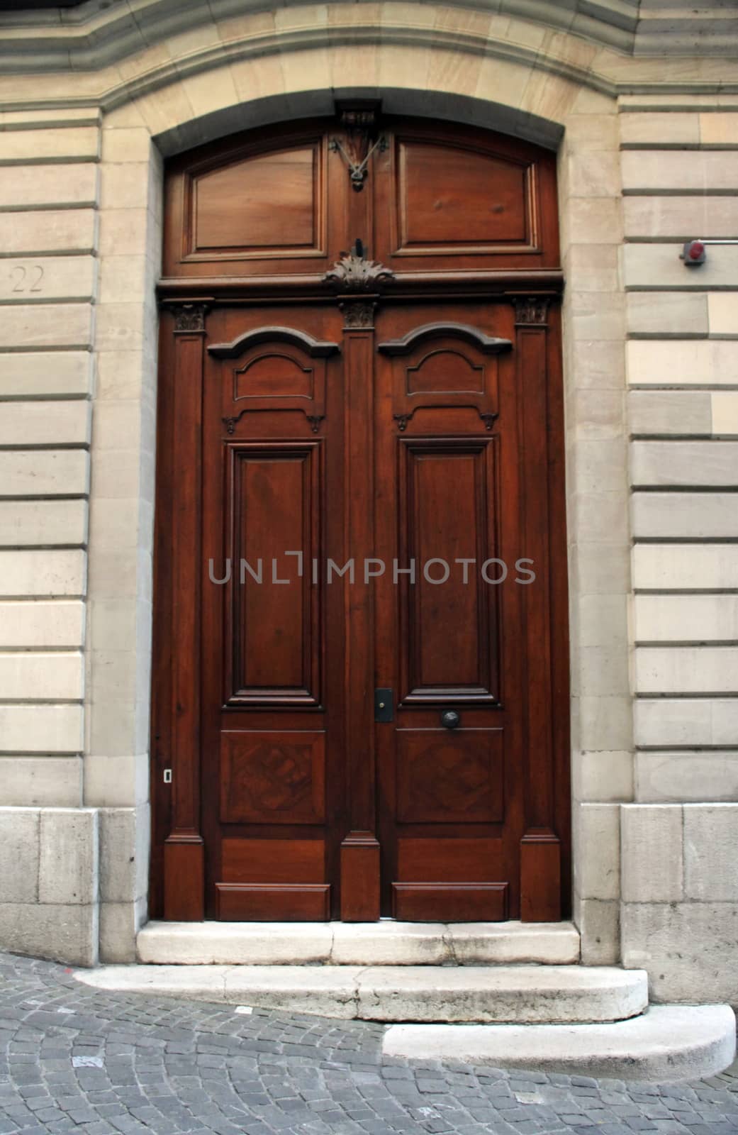 Wooden door and stairs in old city, Geneva, Switzerland