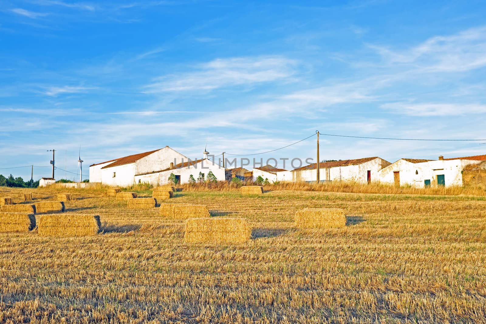 Monte Novo with hay bales in the fields in Portugal
