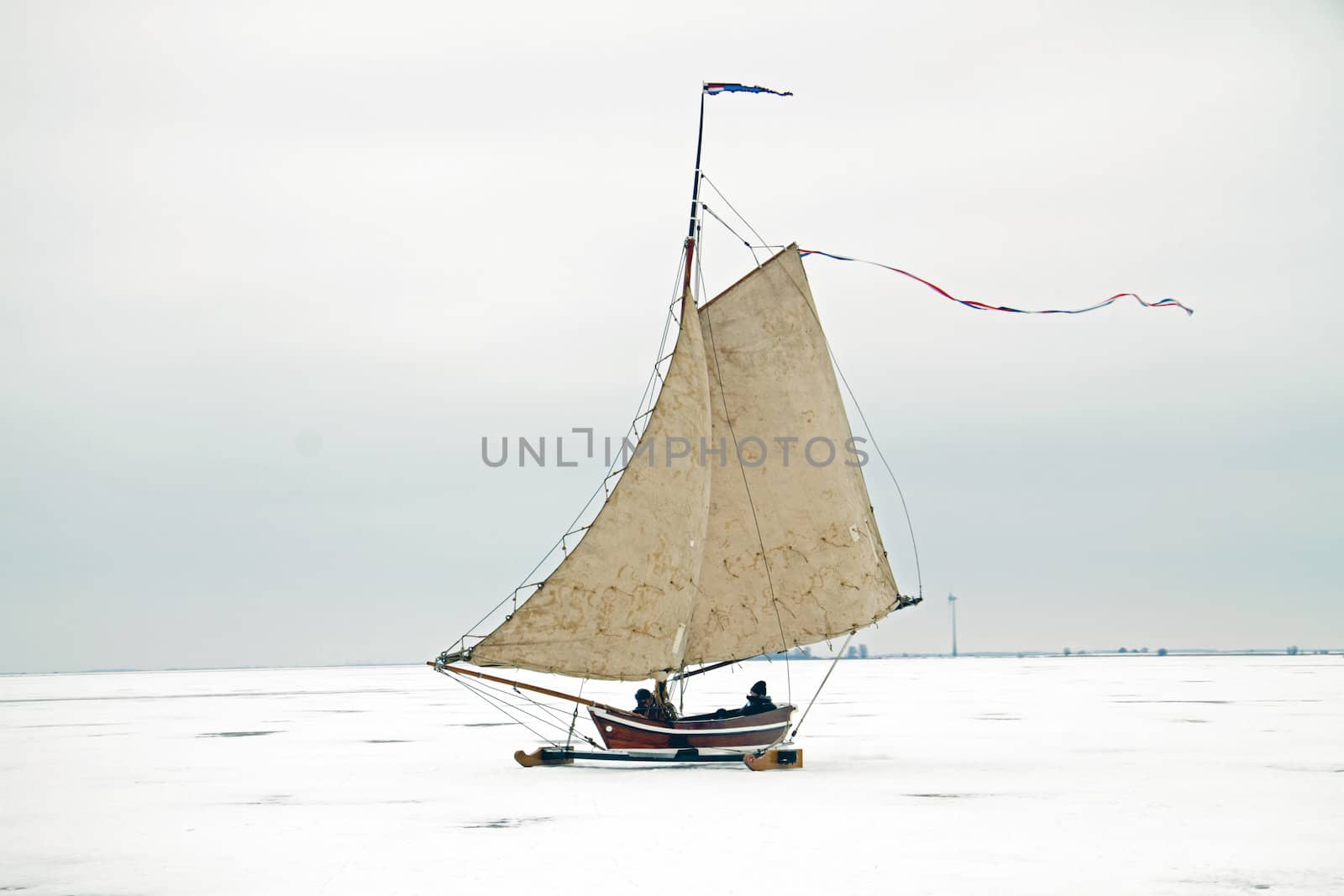 Ice sailing on the Gouwzee in the Netherlands in winter