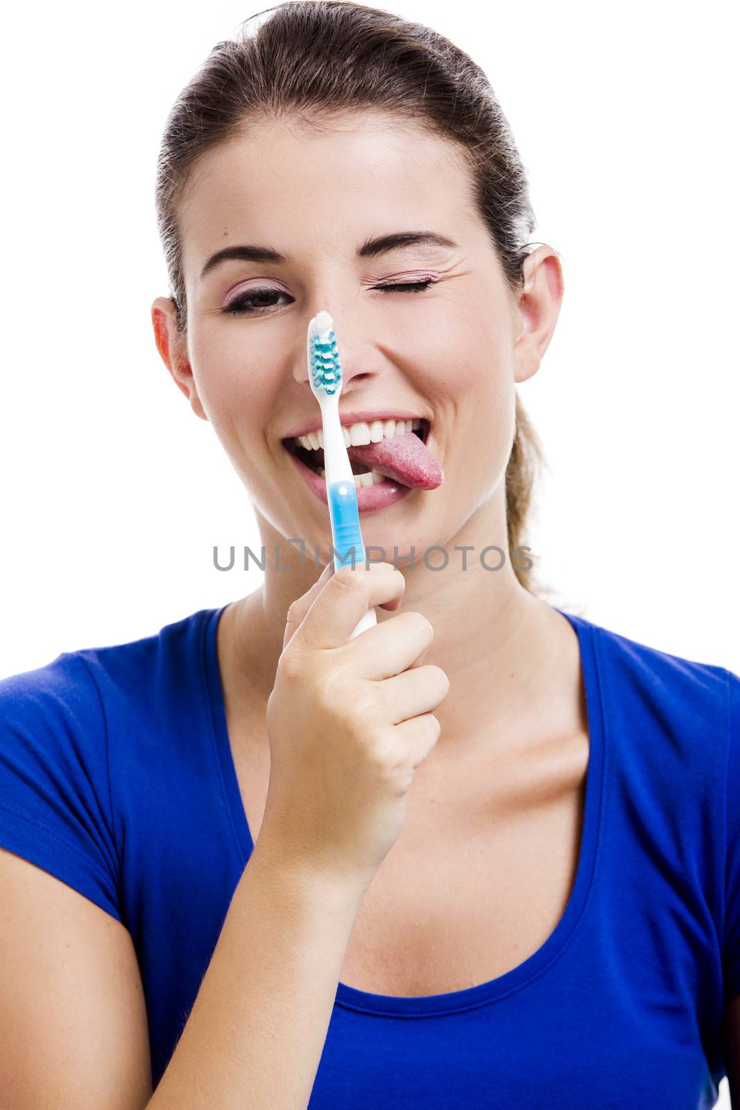 Beautiful woman with a toothbrush by Iko