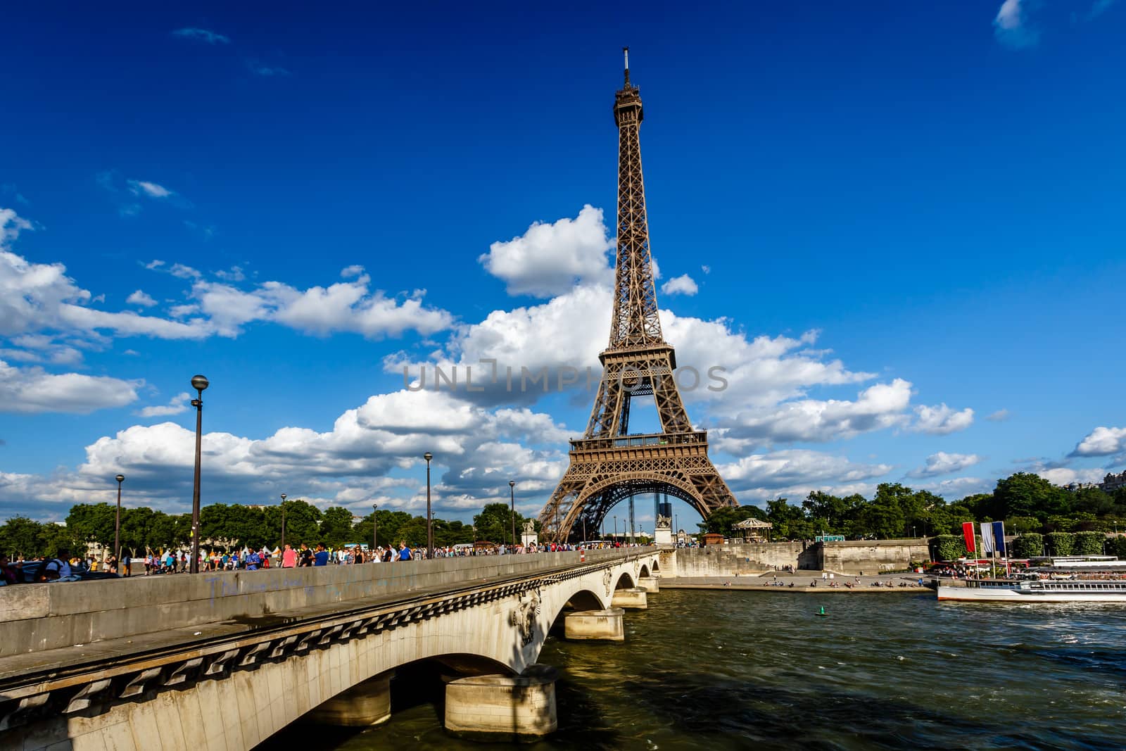 Eiffel Tower and Seine River with White Clouds in Background, Pa by anshar