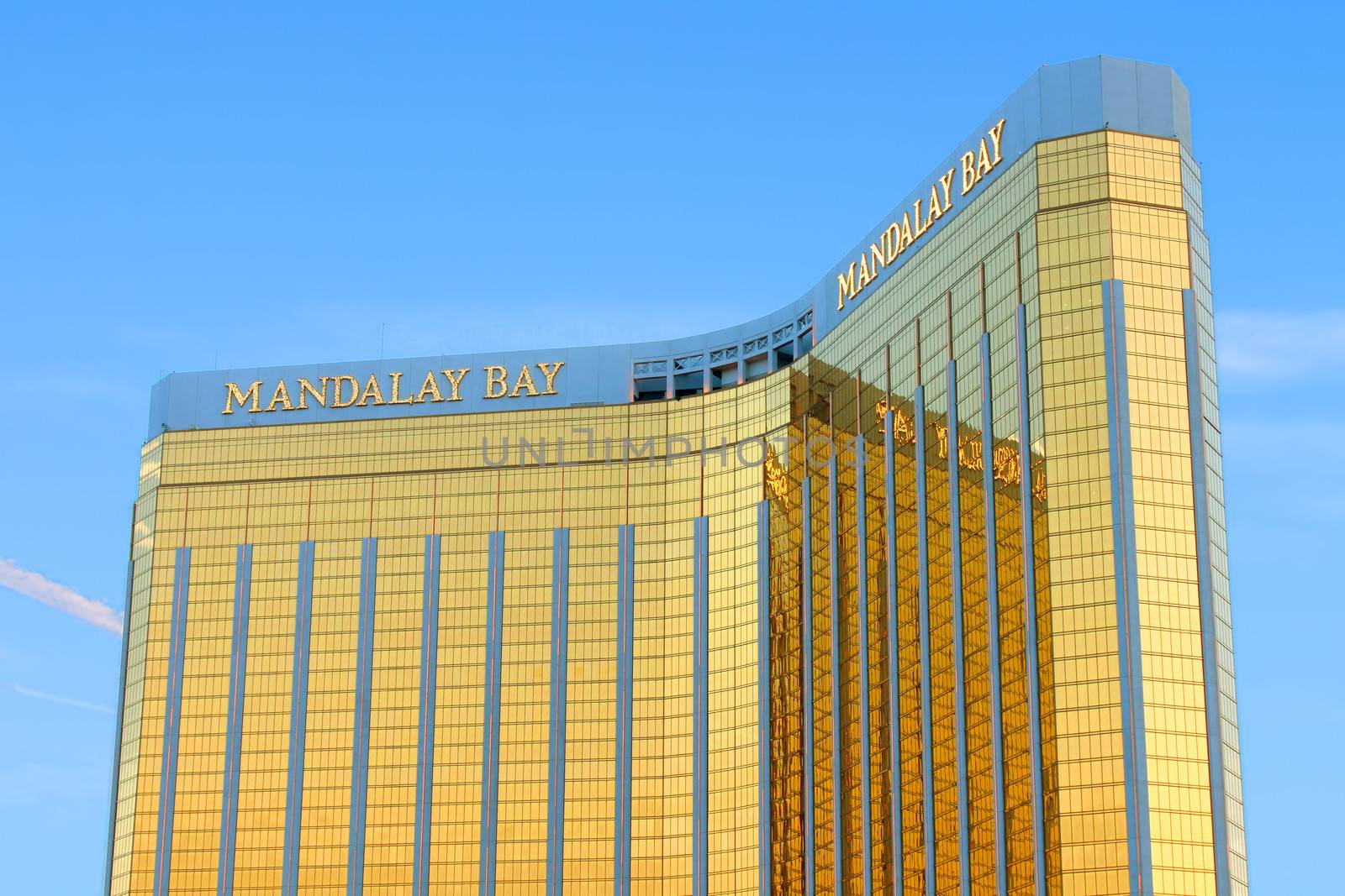 Las Vegas, USA - May 23, 2012: The Mandalay Bay Resort and Casino opened in 1999 in Las Vegas, Nevada.  Seen here is the reflective gold colored exterior of the 44-story tall main building.