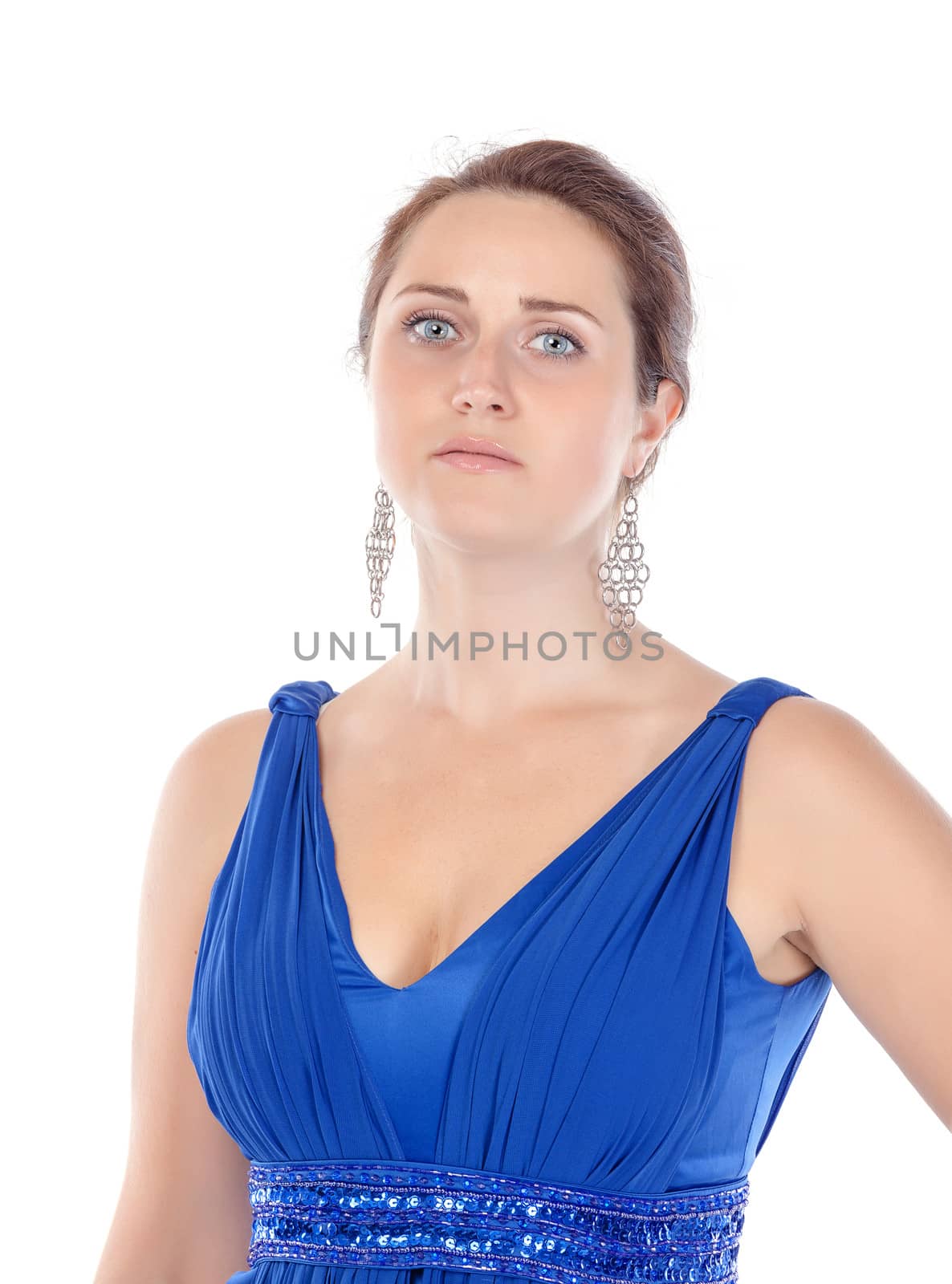 Portrait of a beautiful young woman in blue dress on white background