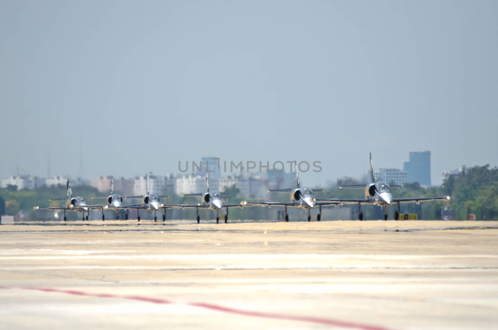 BANGKOK, THAILAND - MARCH 23: Airplanes L - 39UTI  Breitling Jet Team Under The Royal Sky in Don Muang Air Force in Bangkok, Thailand on March 23, 2013