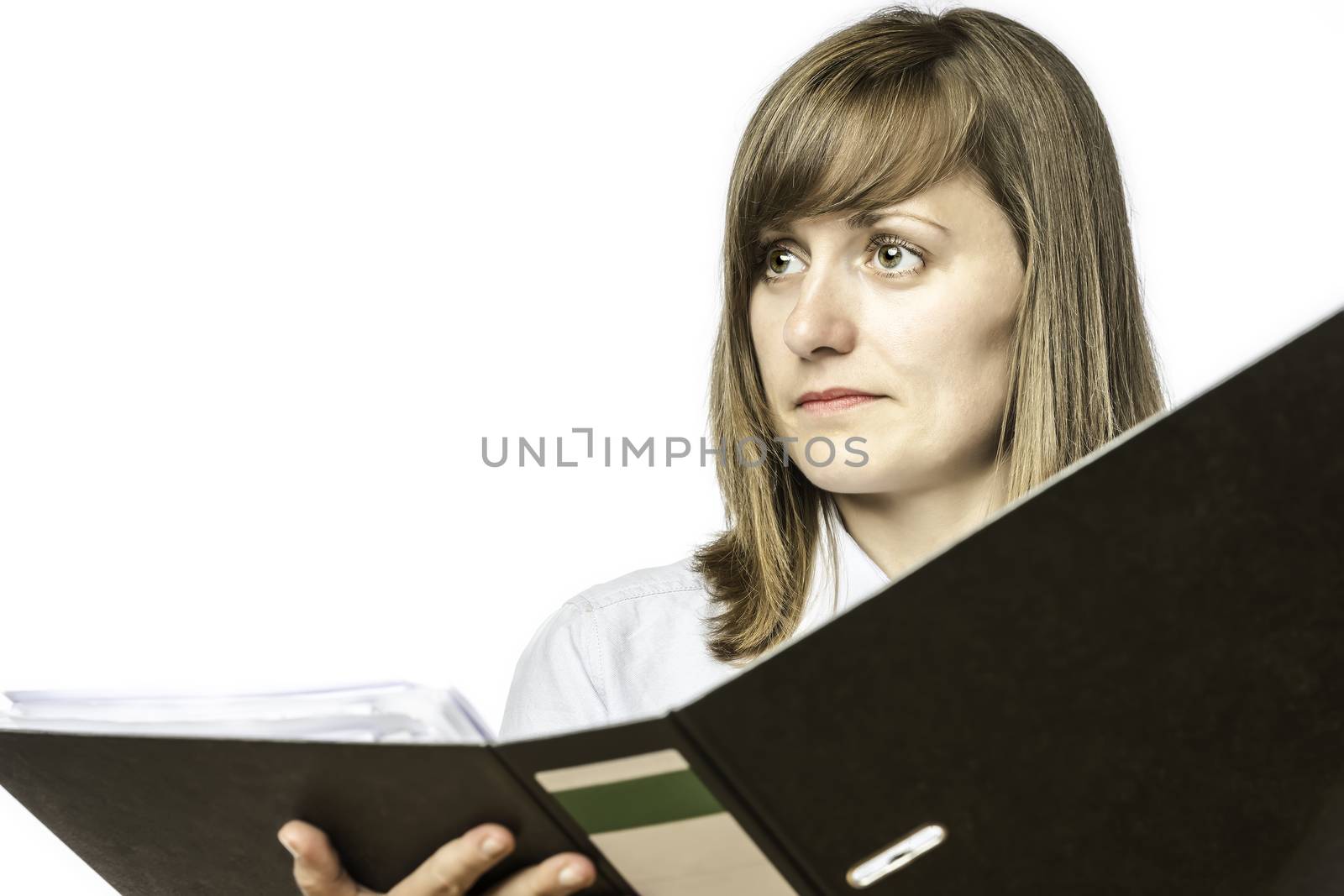 Young woman holding an open file folder, isolated on white background