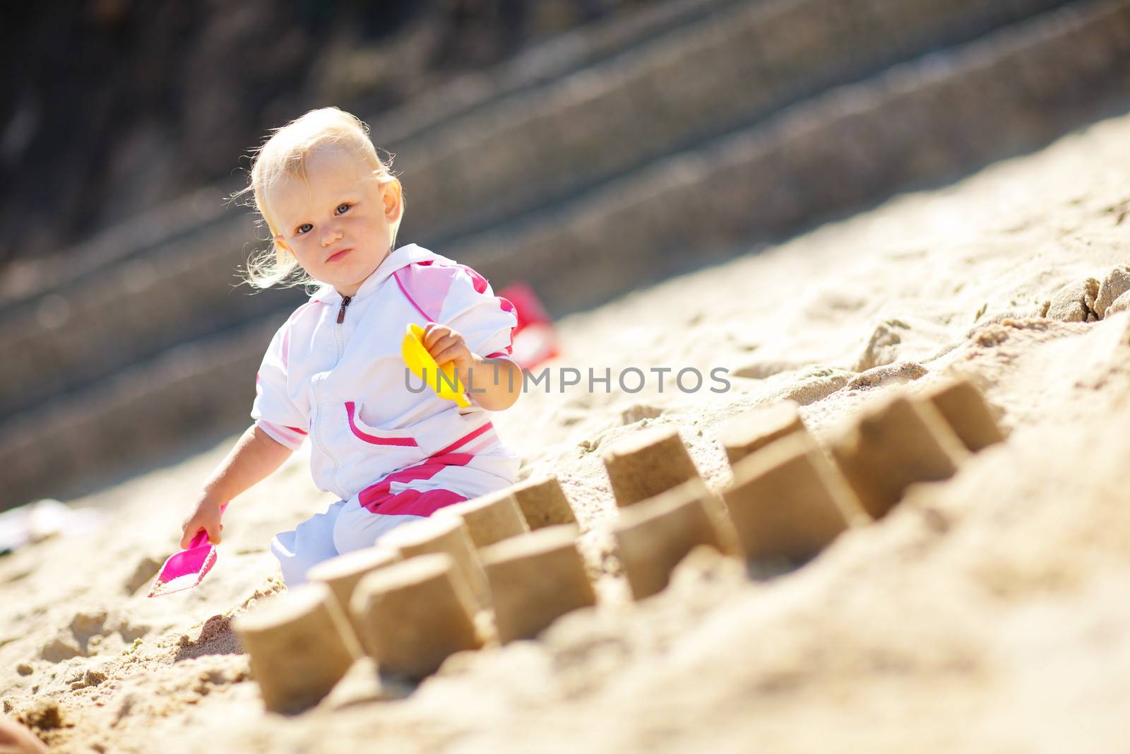 playing on the sand child by vsurkov