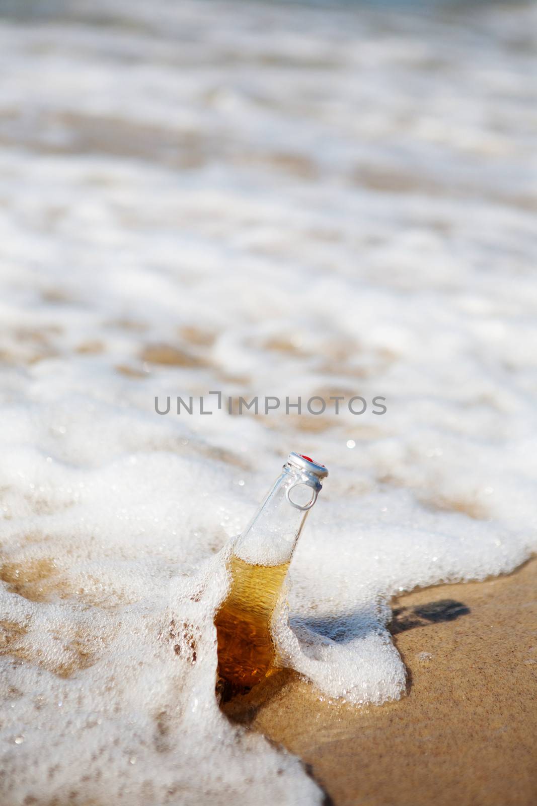 bottle of beer in the sea