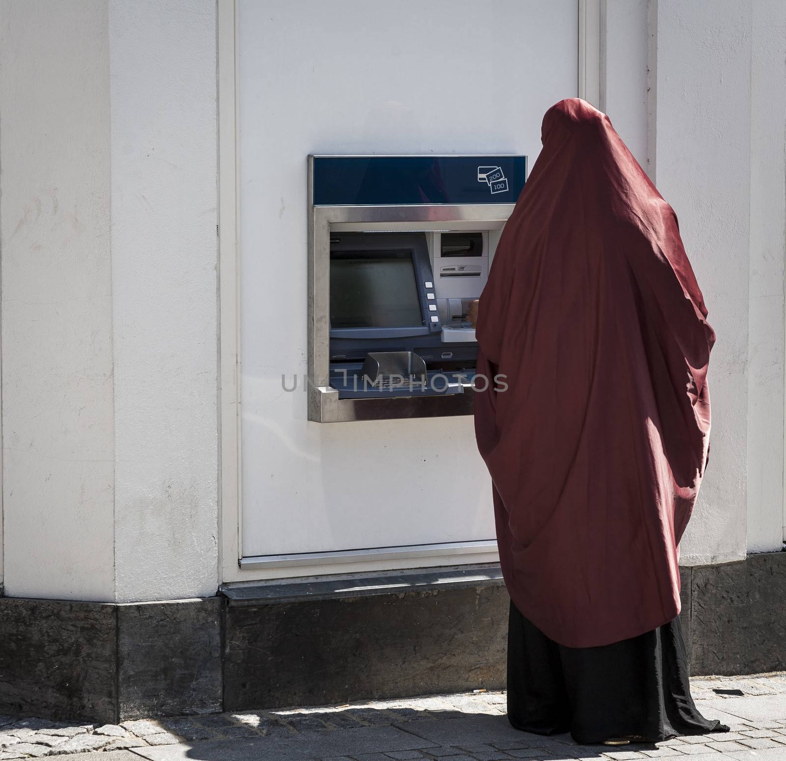 Muslim lady by cashpoint by ABCDK