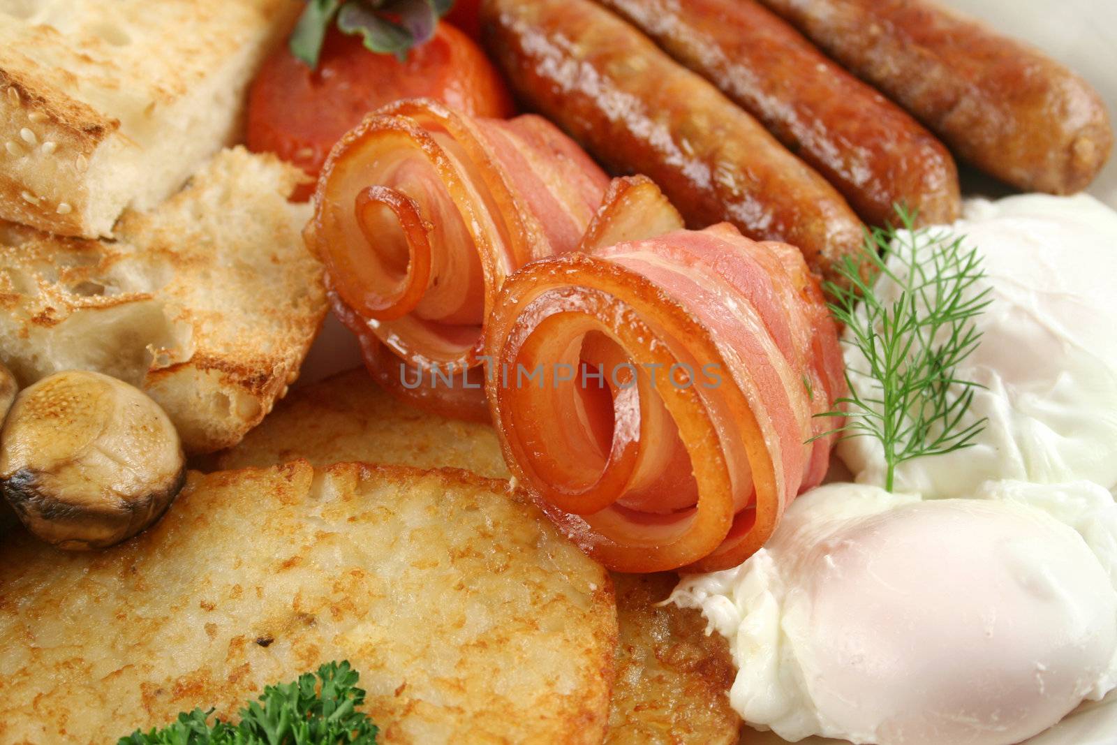 Ploughmans big breakfast of sausages, bacon, eggs, hash browns, mushrooms and toast.