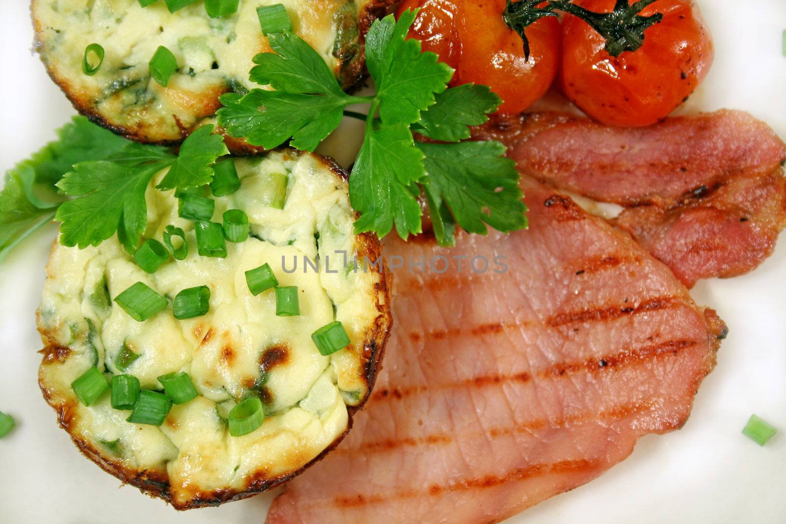 Ricotta and spinach tarts with bacon and oven baked balsamic cherry tomatoes.