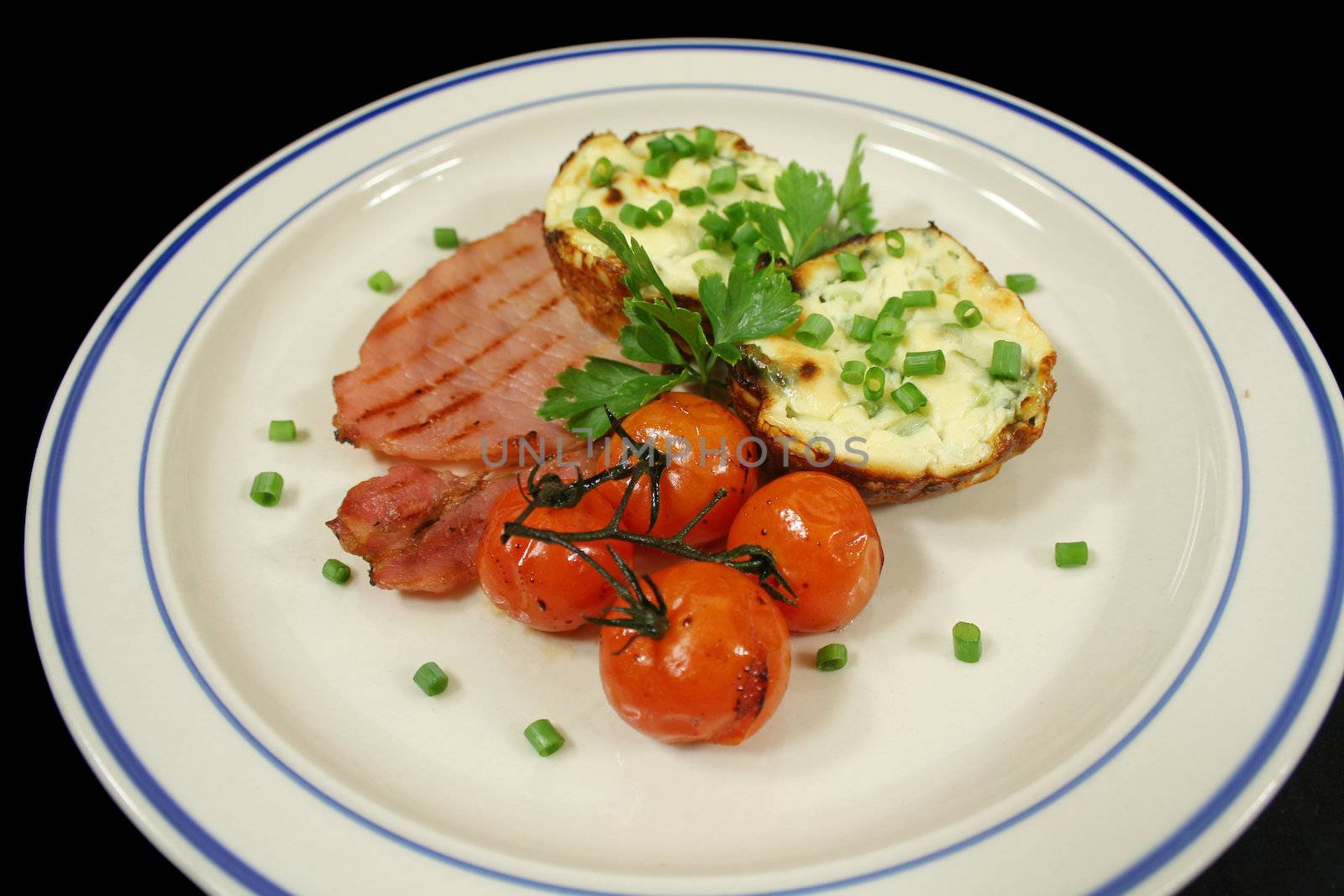 Ricotta and spinach tarts with bacon and oven baked balsamic cherry tomatoes.