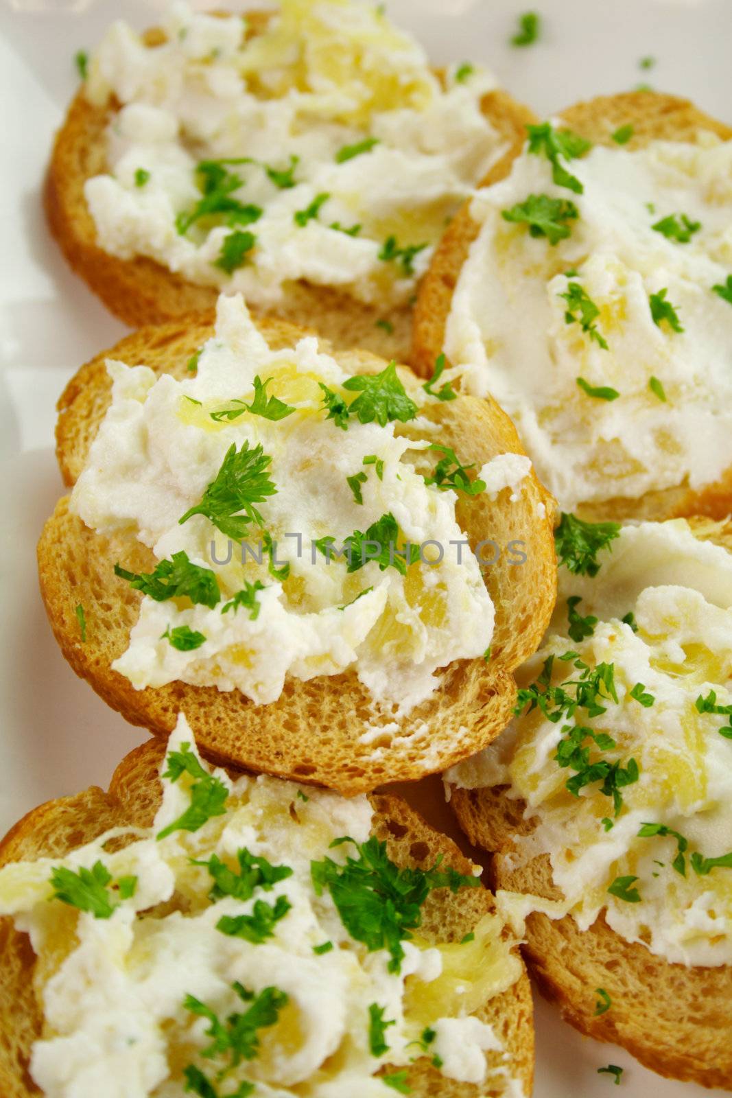 Pineapple ricotta with parsley spread on toast.