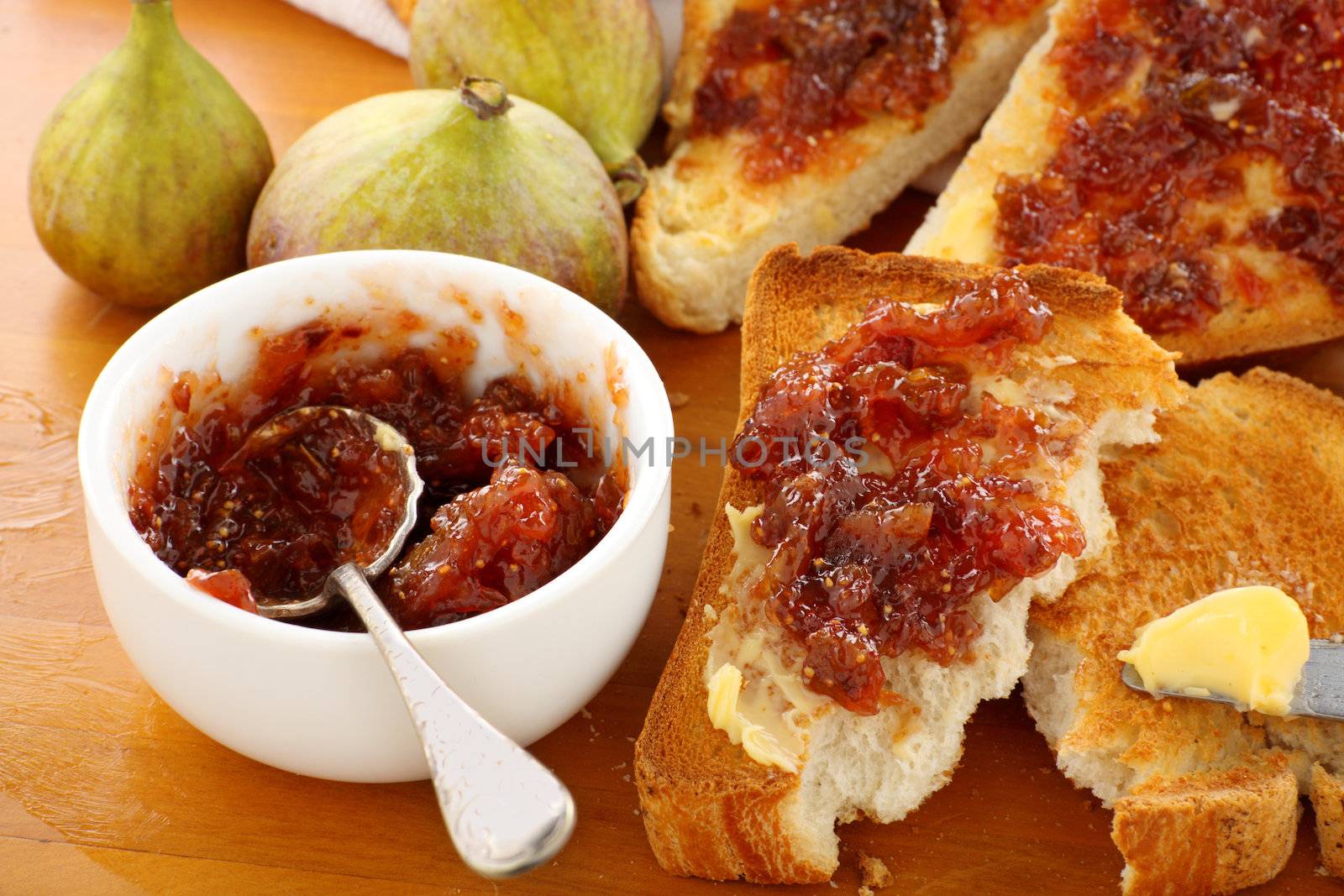 Rustic homemade fig jam sandwiches on toast ready to serve.