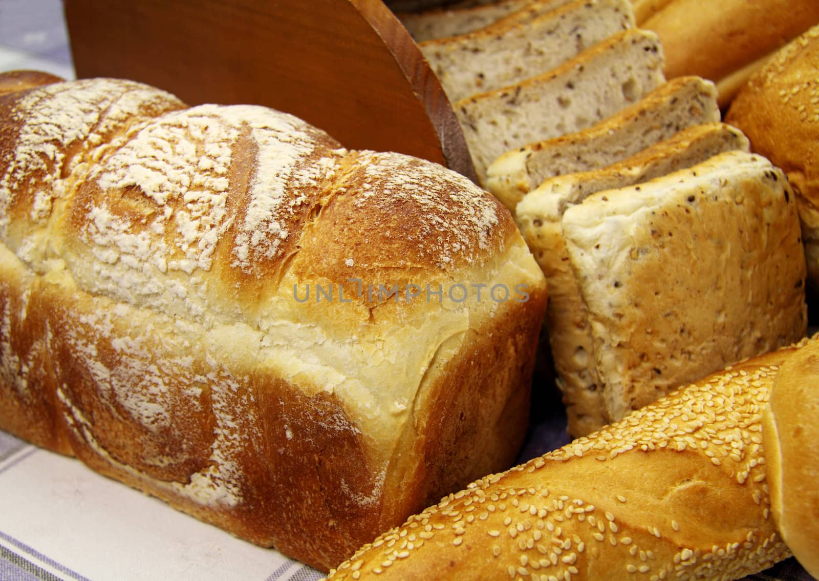 Selection of different types of rolls, loaves and bread.