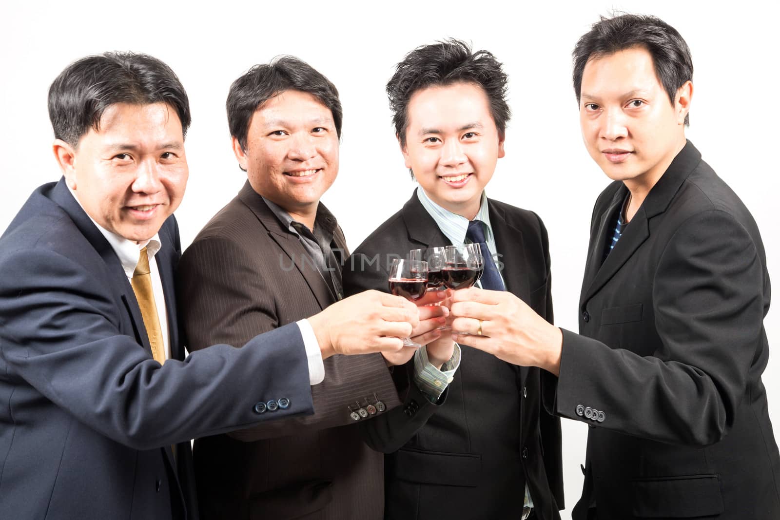 Businessman celebrate with wine for their business success
