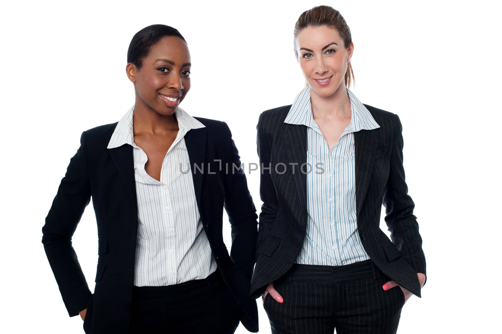 Stylish corporate women posing casually by stockyimages