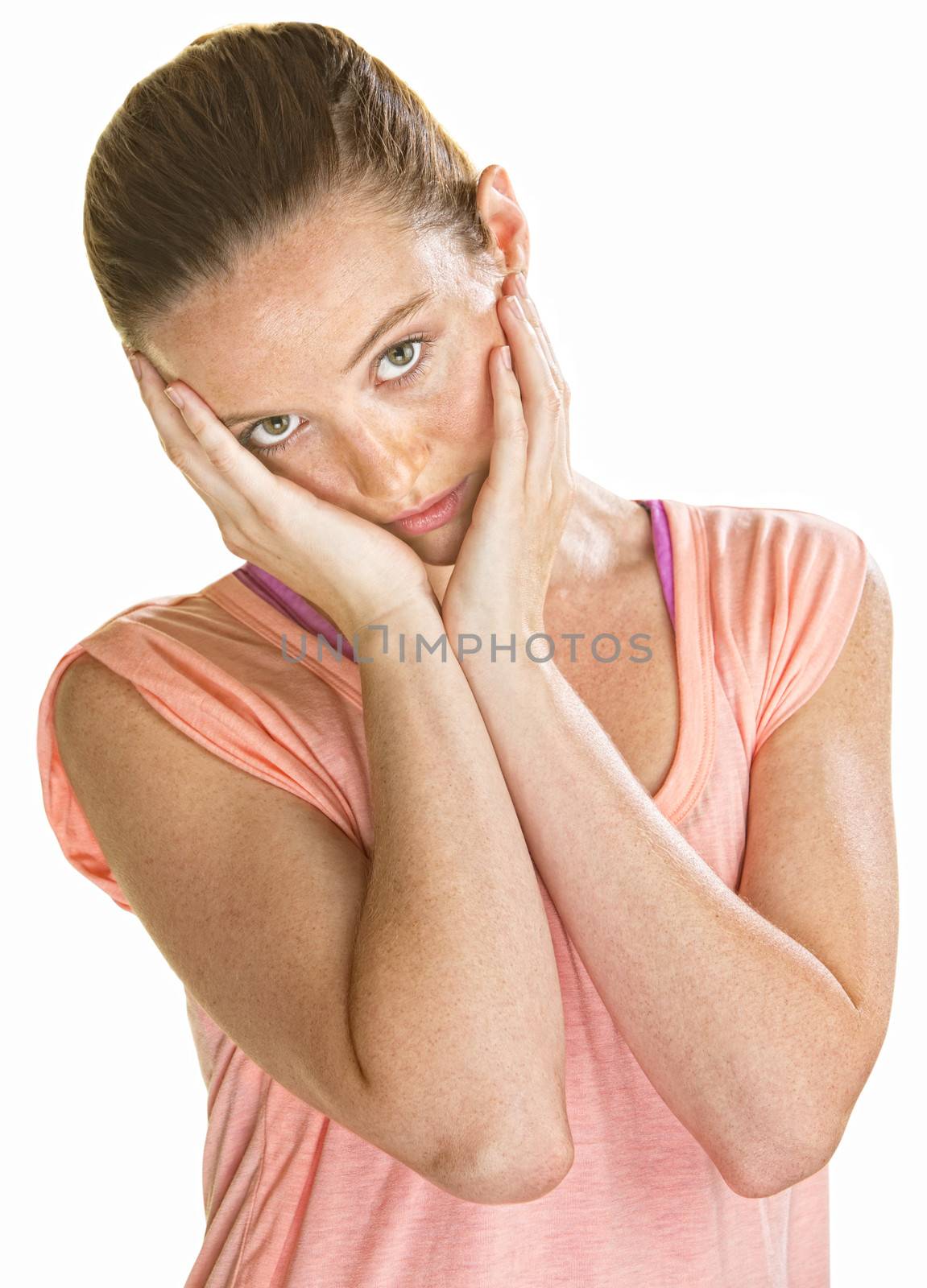 Sad lady holding her face with her hands