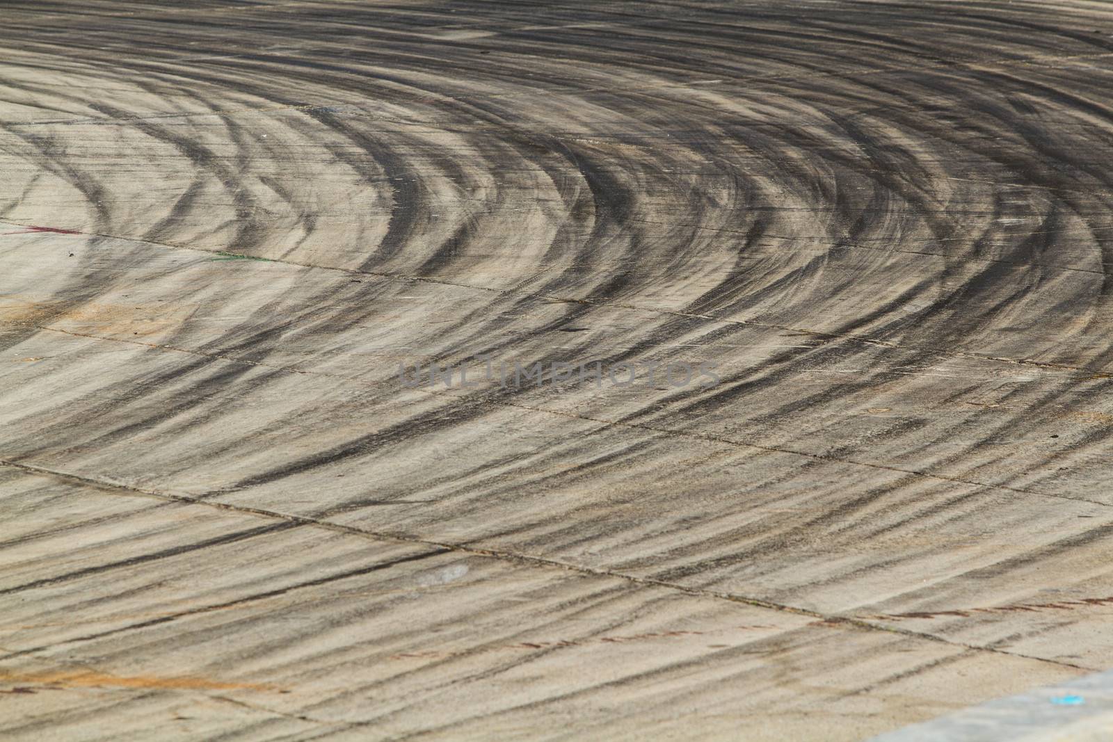 Background with tire marks on road track