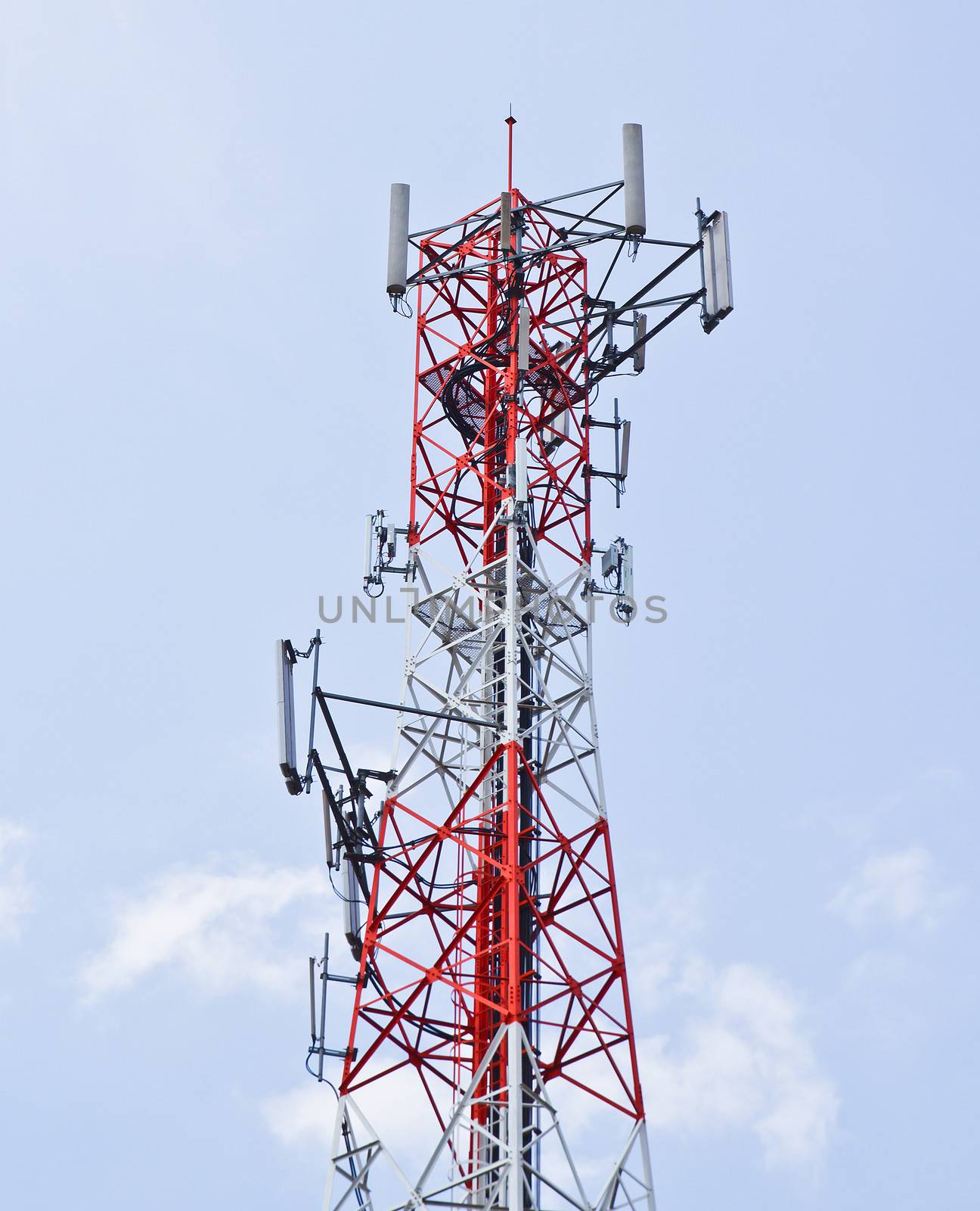 Telecommunication tower with a sunlight. Used to transmit television signals.