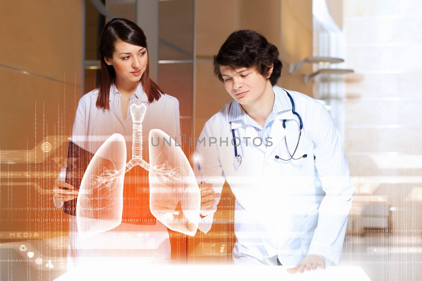 Image of two young doctors examining virtual image of lungs
