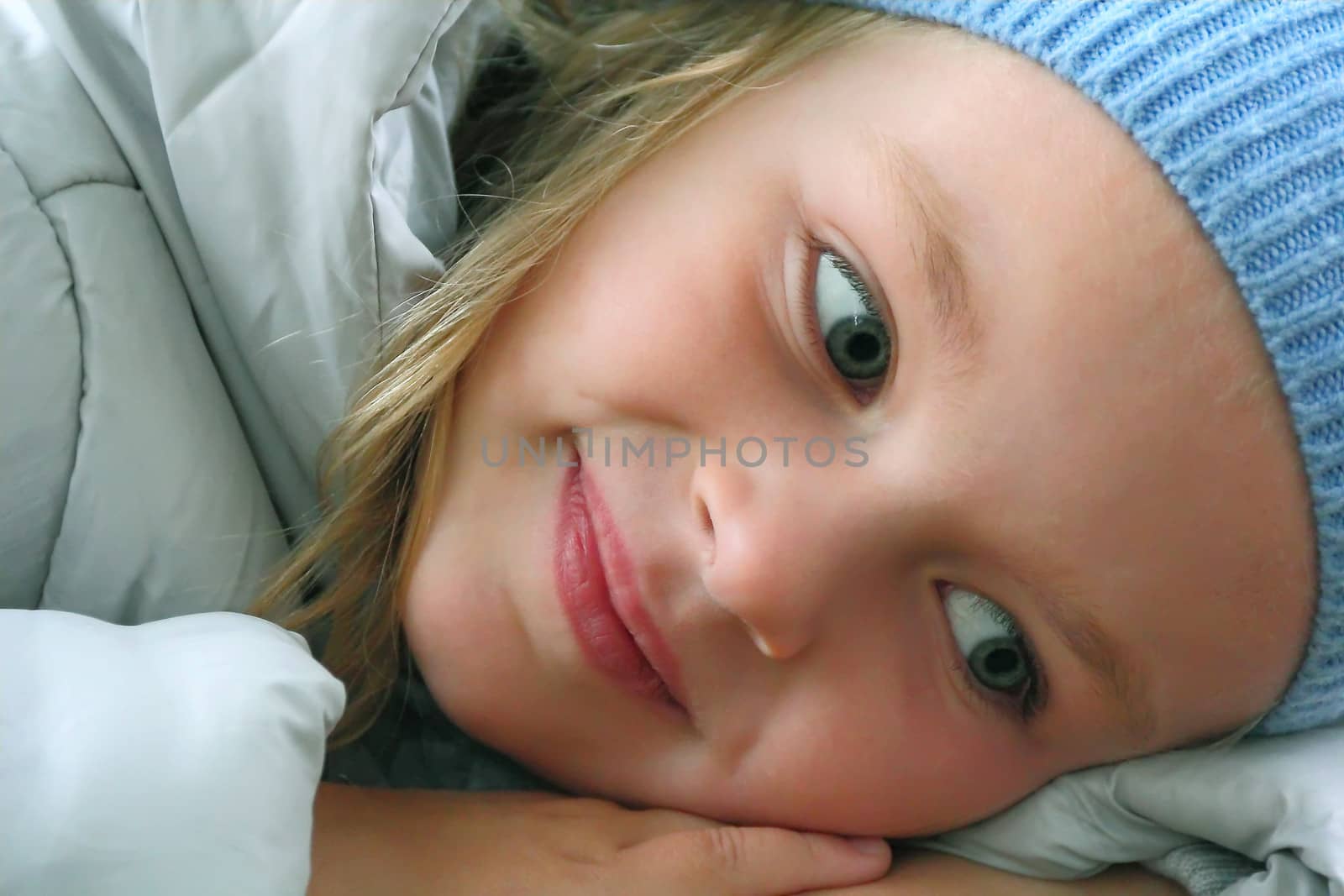 Portrait of beautiful girl with blue eyes