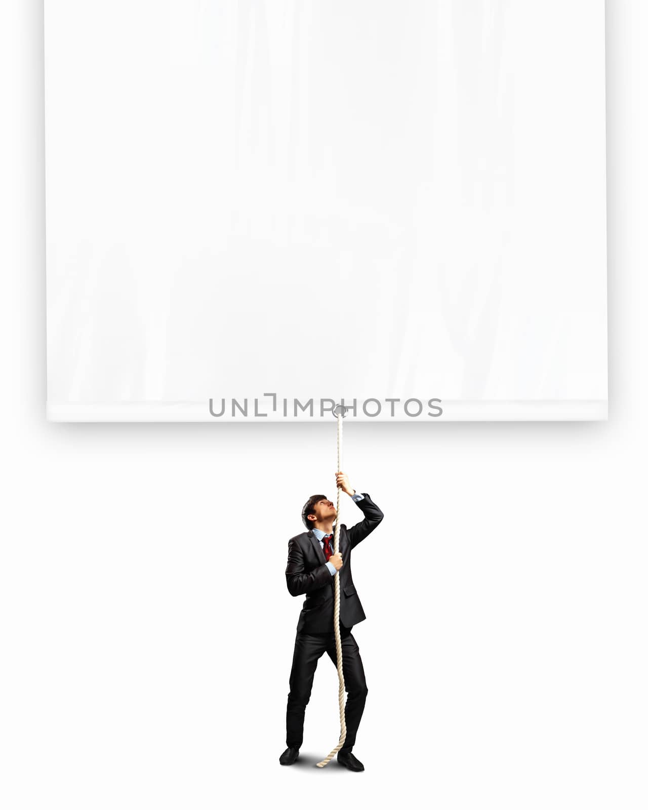 Businessman pulling blank banner by sergey_nivens
