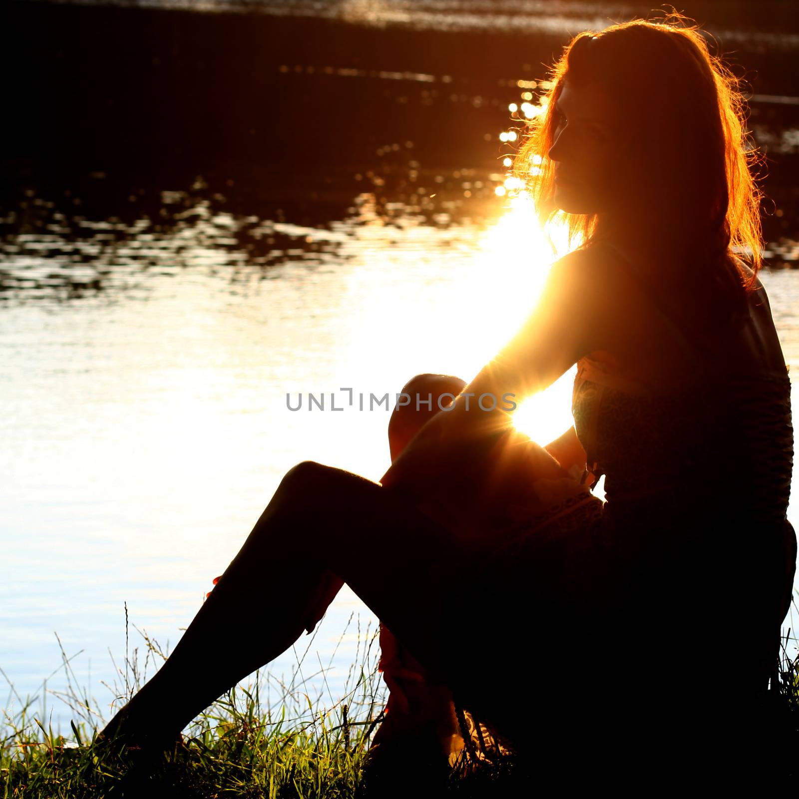 Girl sitting on tha bank of forest river by Yellowj