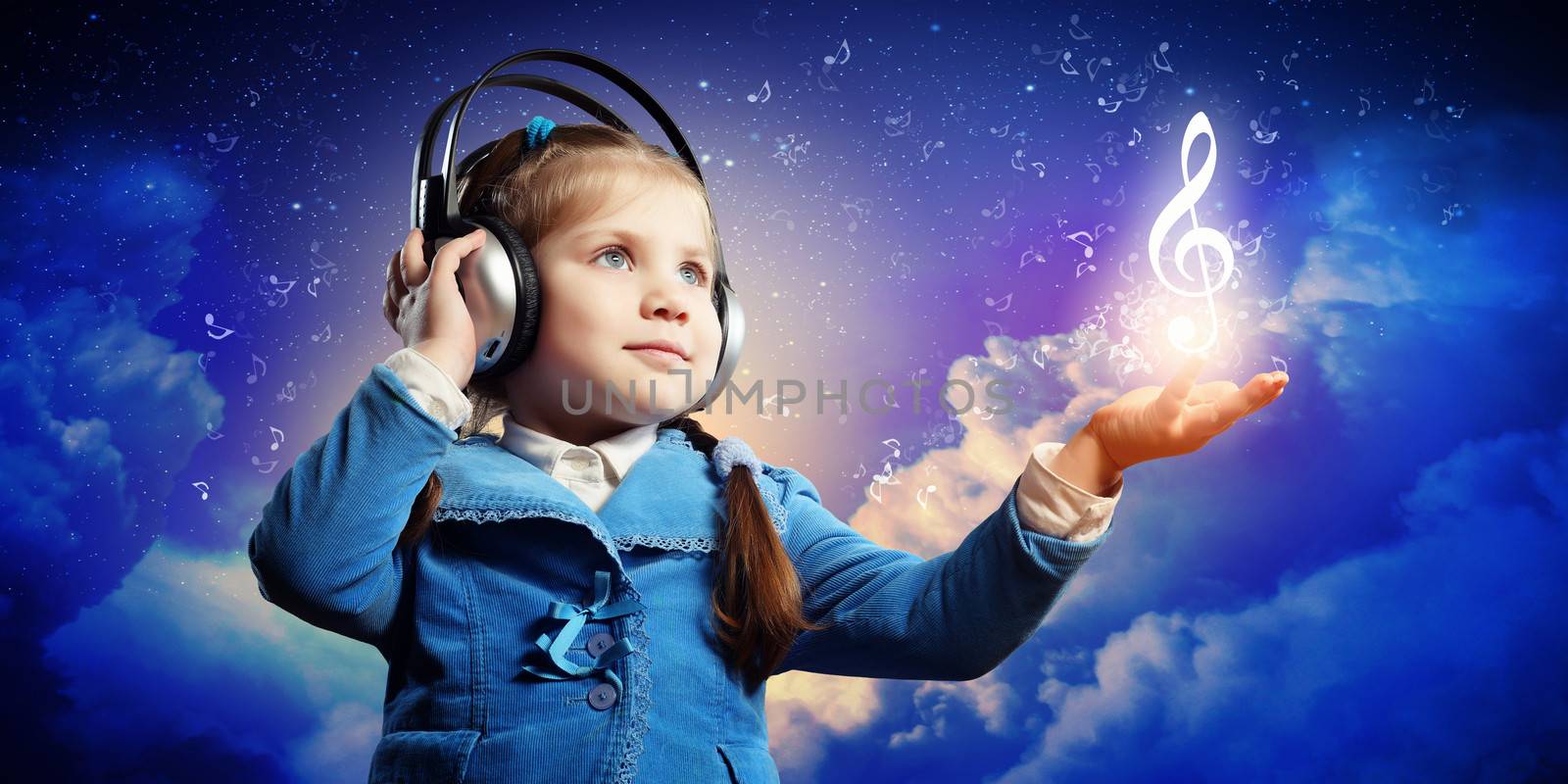 Little girl in headphones by sergey_nivens