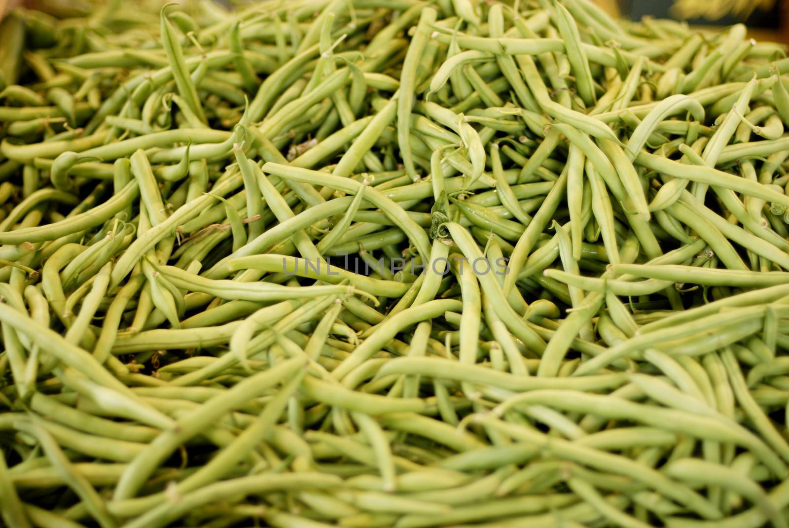 Large pile of french beans on the local market