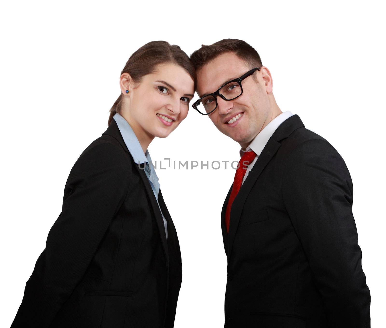 Happy business couple head in head smiling to the camera isolated against a white background.