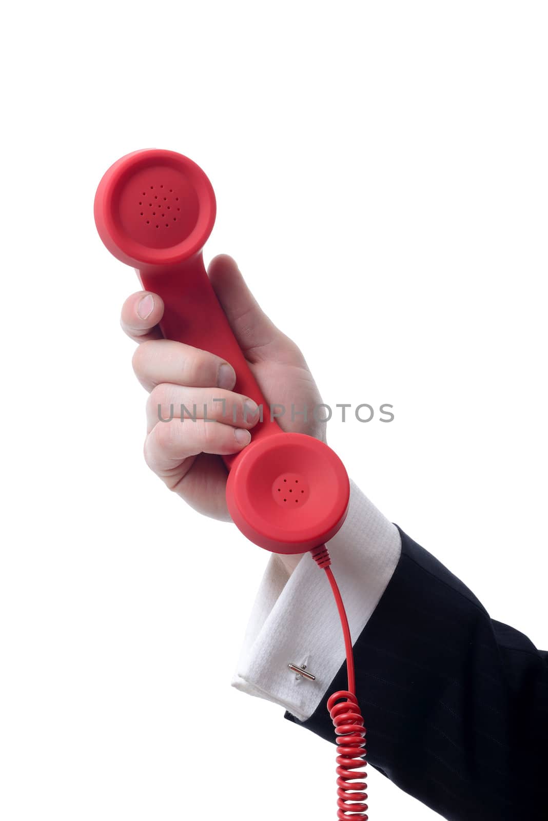 Businessman holding out a red phone receiver