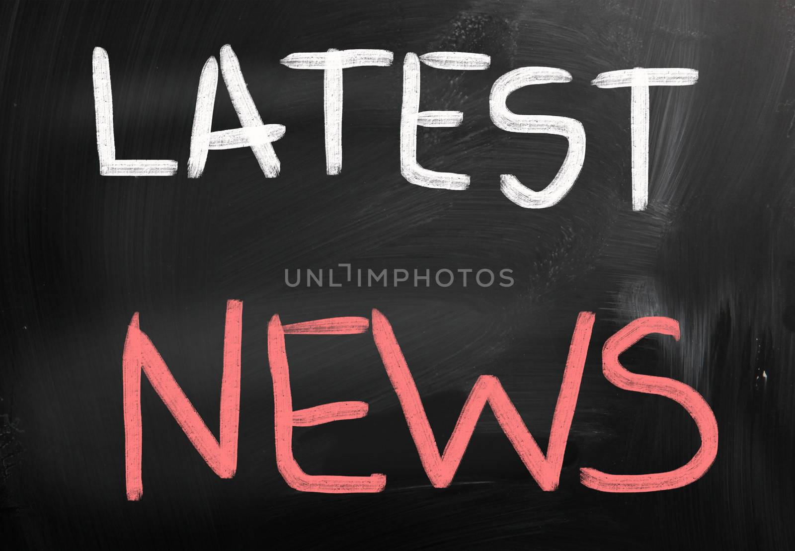 News handwritten with chalk on a blackboard