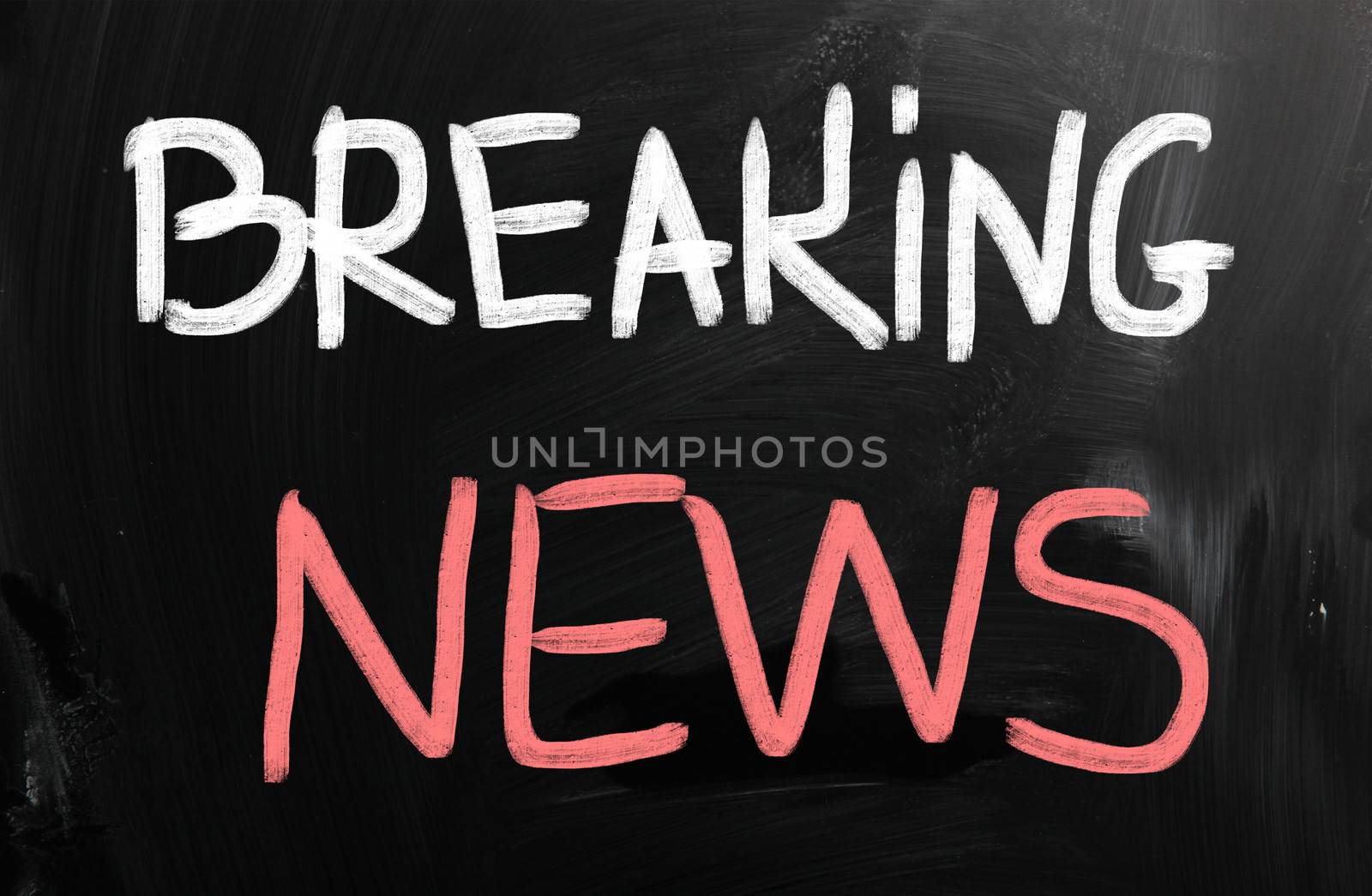 News handwritten with chalk on a blackboard