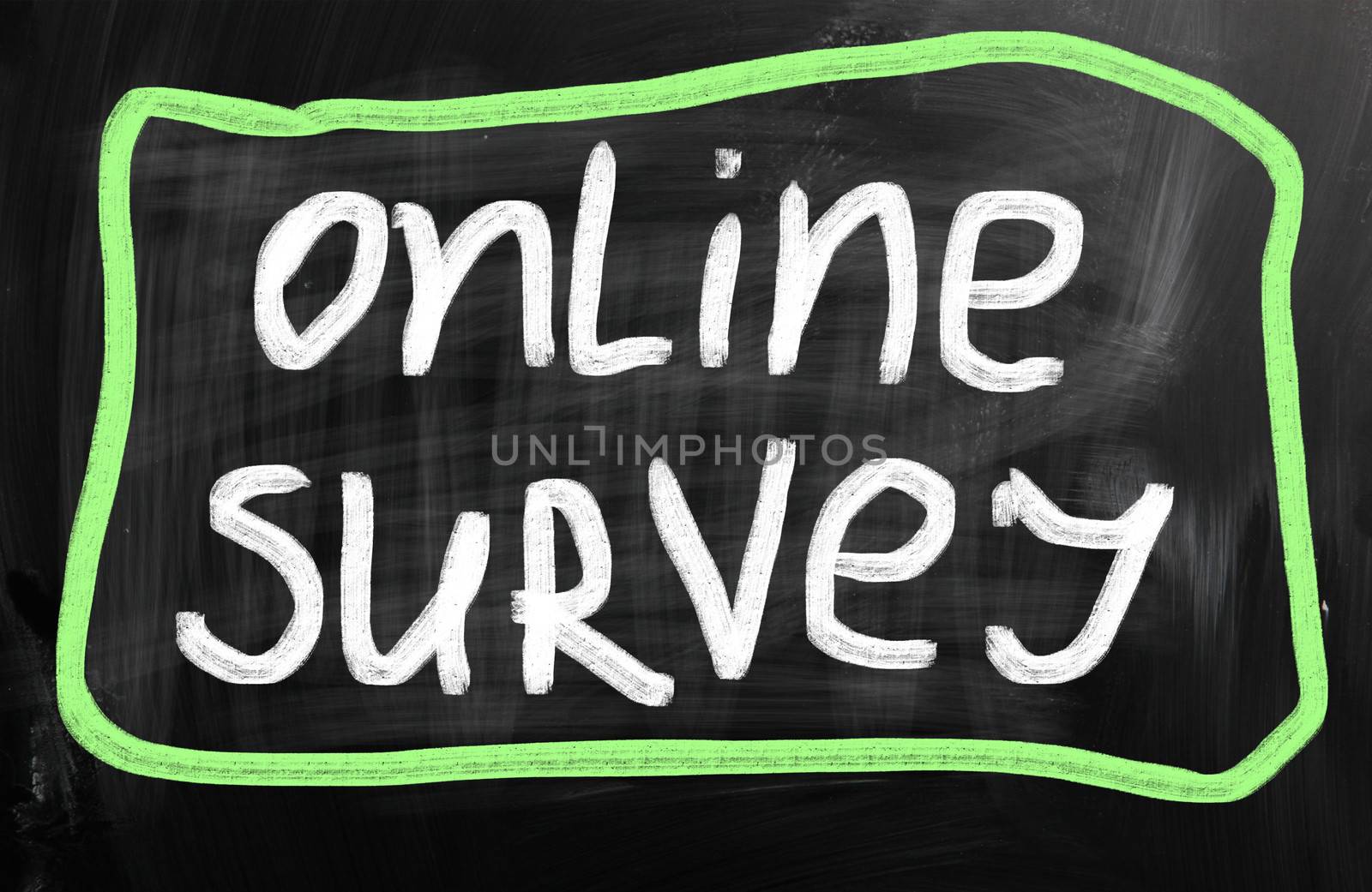 Online survey handwritten with chalk on a blackboard