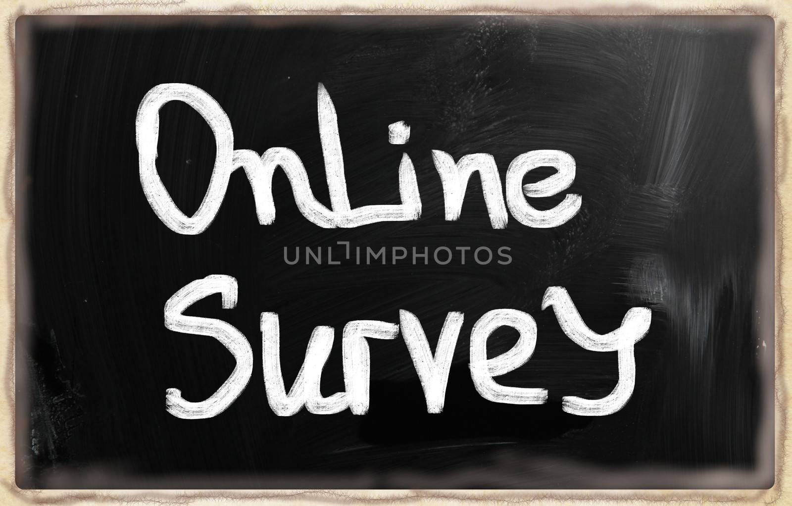 Online survey handwritten with chalk on a blackboard