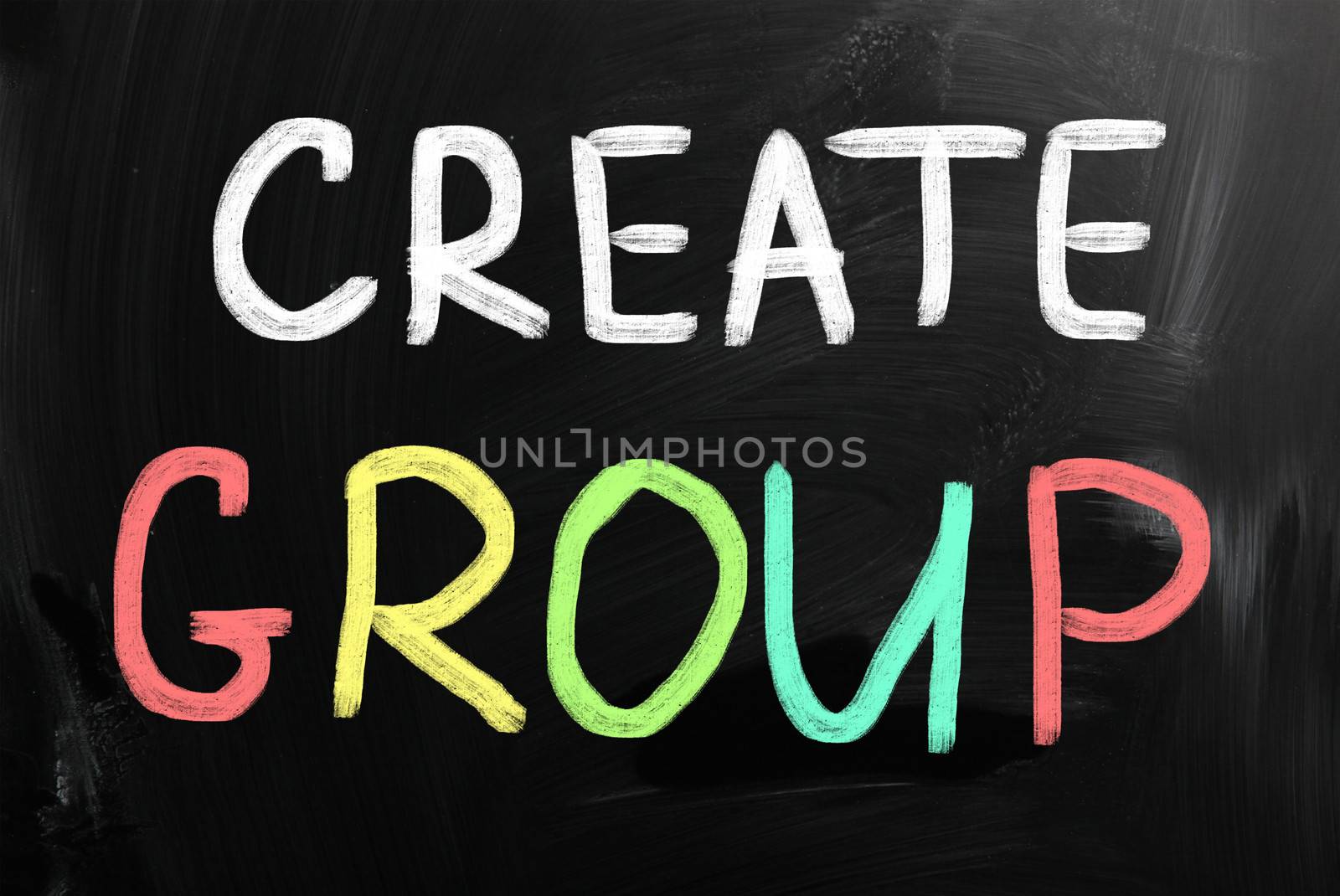 Create group handwritten with chalk on a blackboard