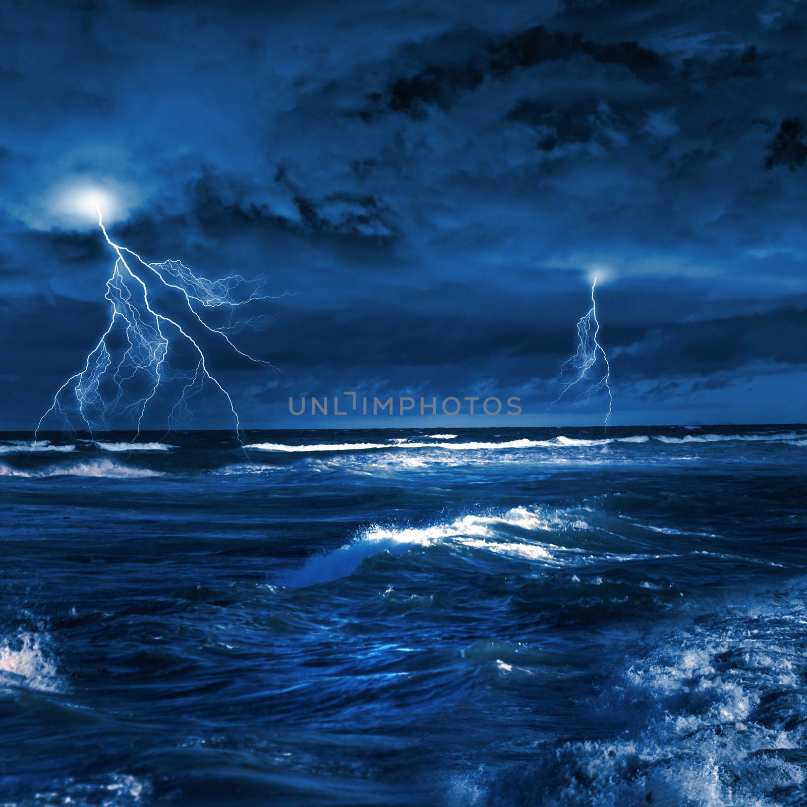 Image of night stormy sea with big waves and lightning