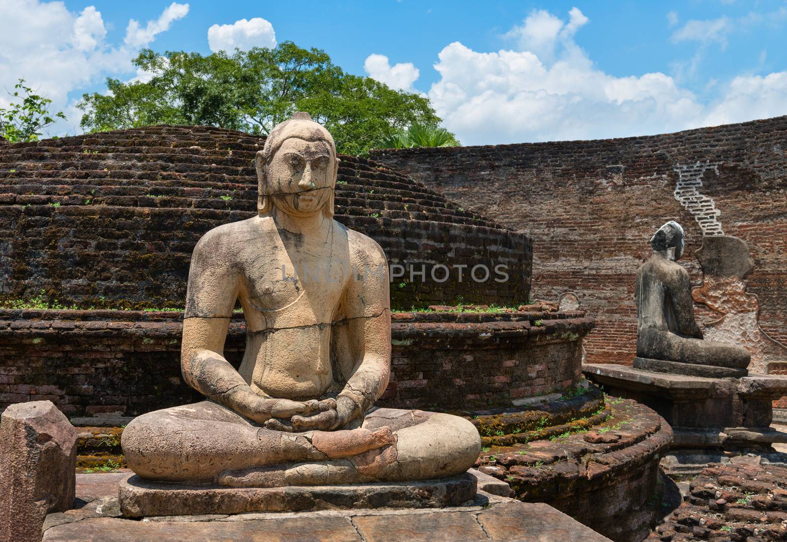 Ancient Buddha statue of temple ruins in ancient city of Polonnaruwa, Sri Lanka 
