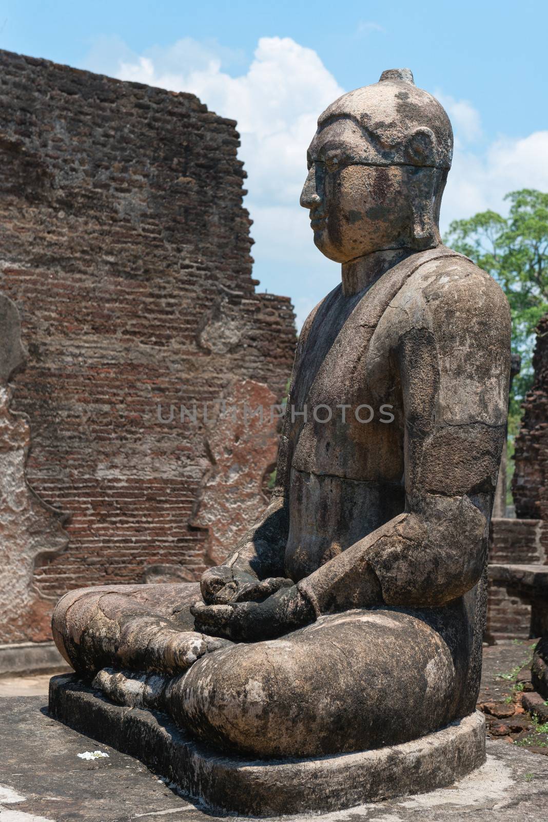 Ancient Buddha statue of temple ruins in ancient city of Polonnaruwa, Sri Lanka 