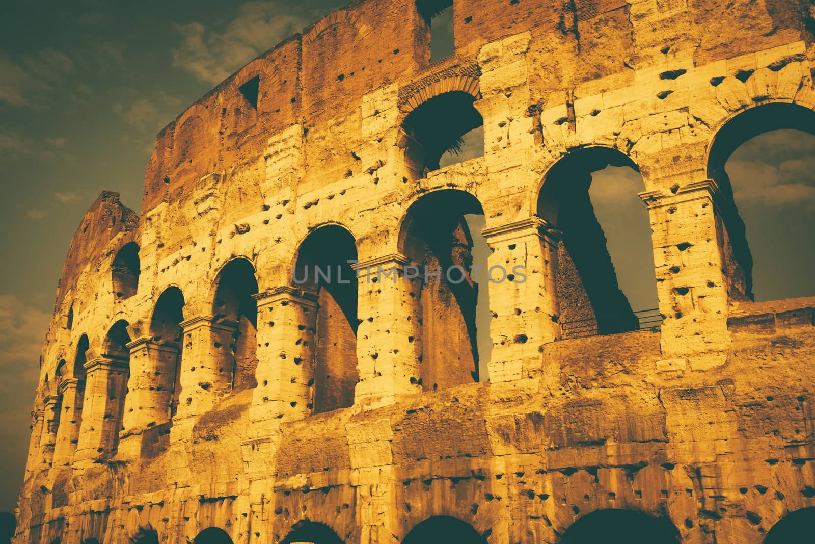 The Colosseum in Rome Italy done in an old film style.