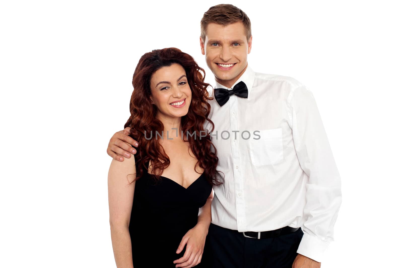 Profile shot of a romantic cheerful  couple posing together against white background