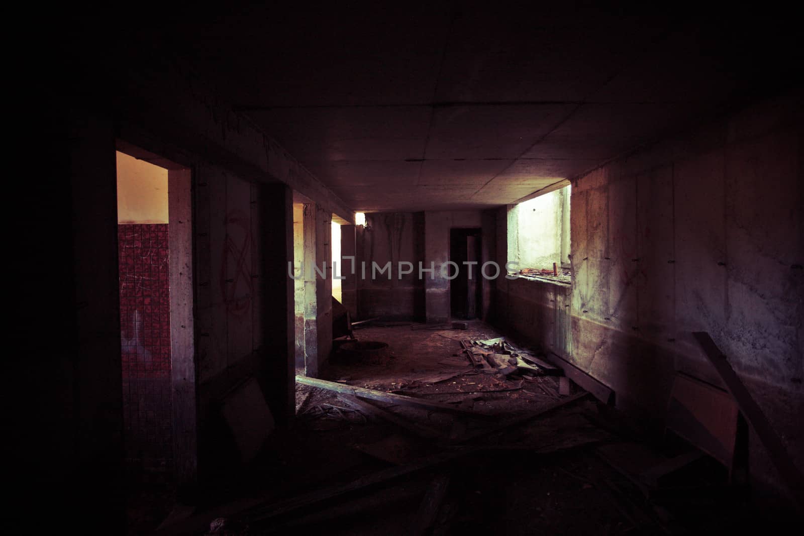 Dark interior of an abandoned farmhouse by jrstock