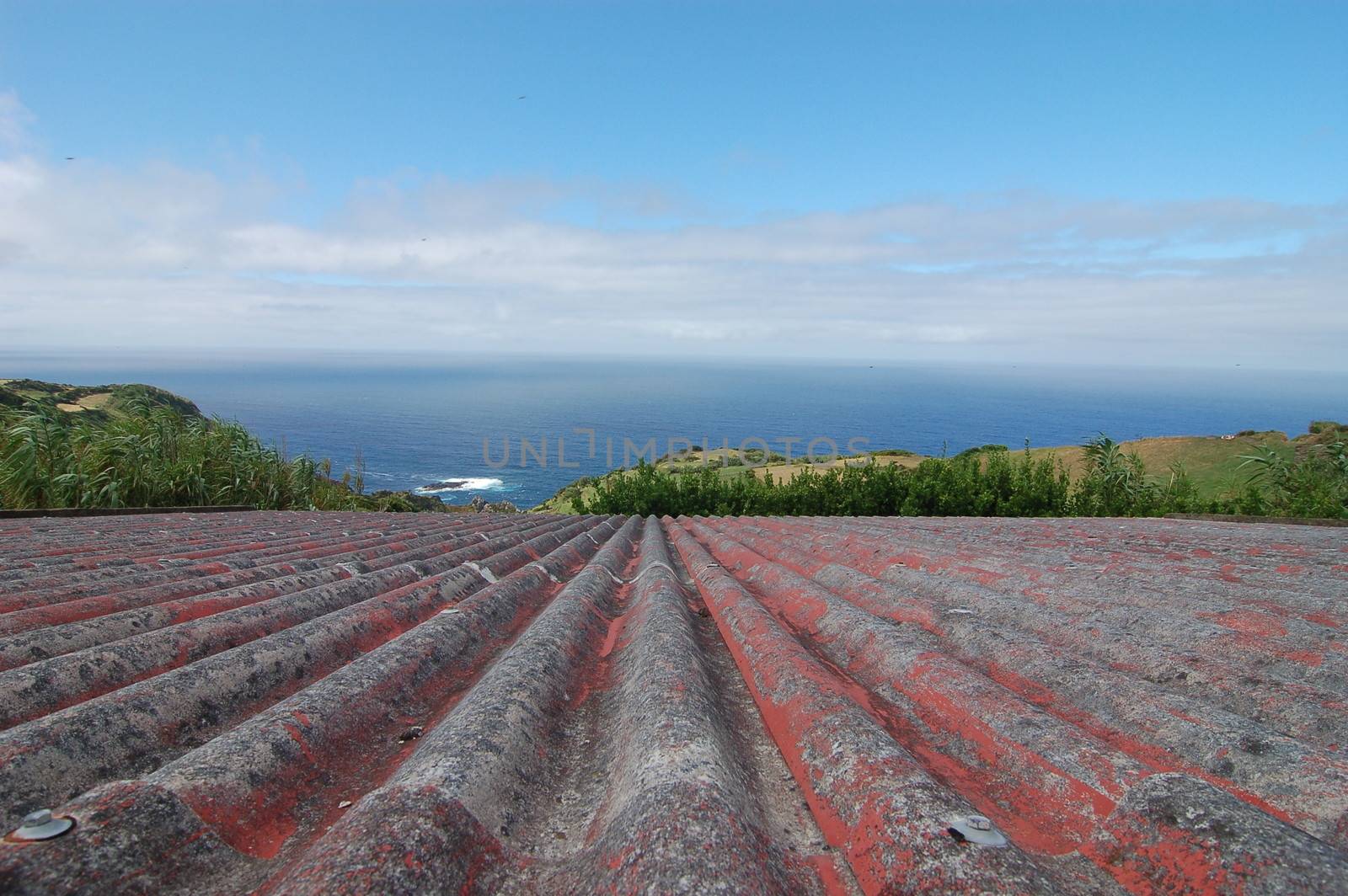 coast of flores island in azores, Portugal - view from above the roof