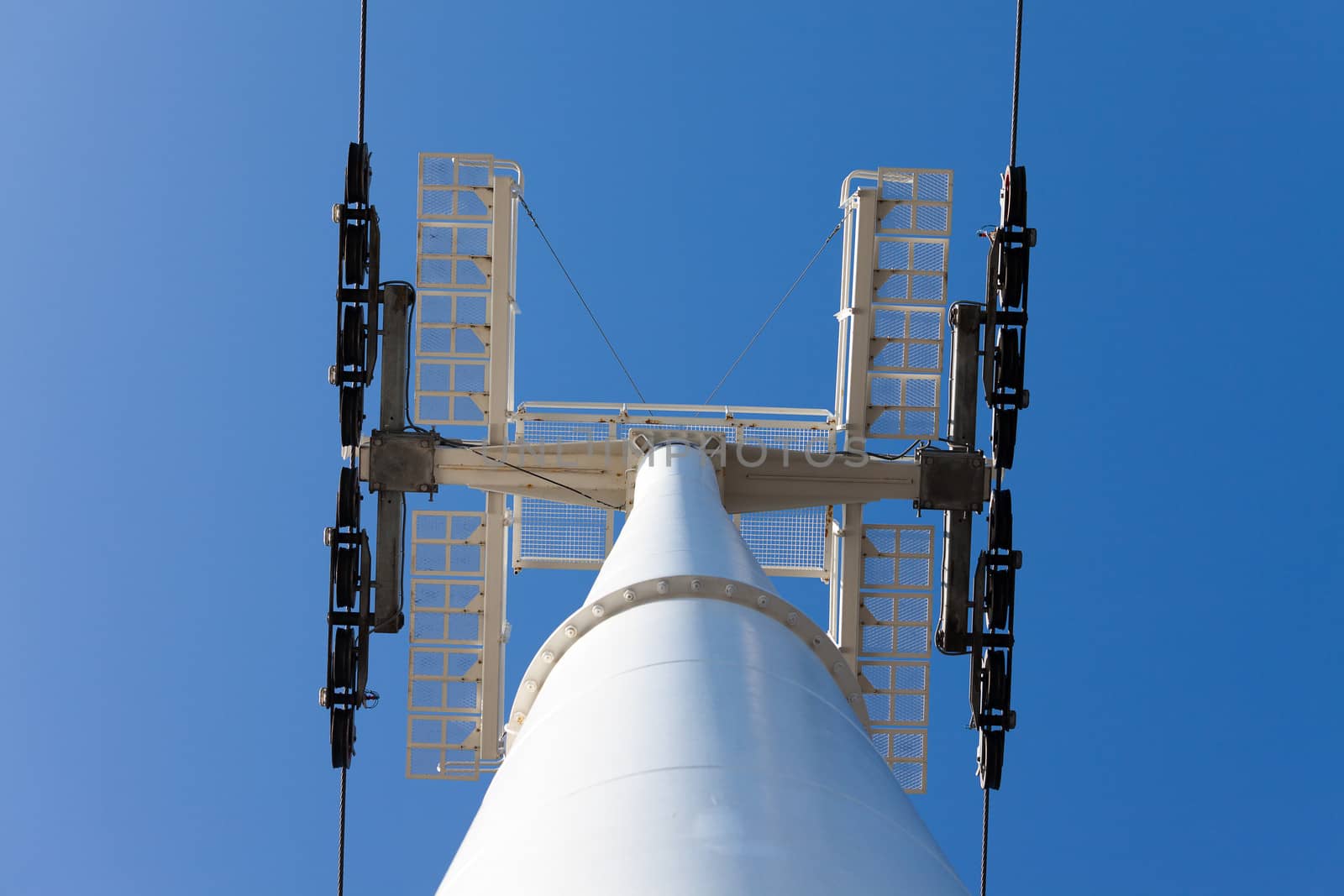 Cable car on blue sky background, in Expo district, Lisbon, Portugal