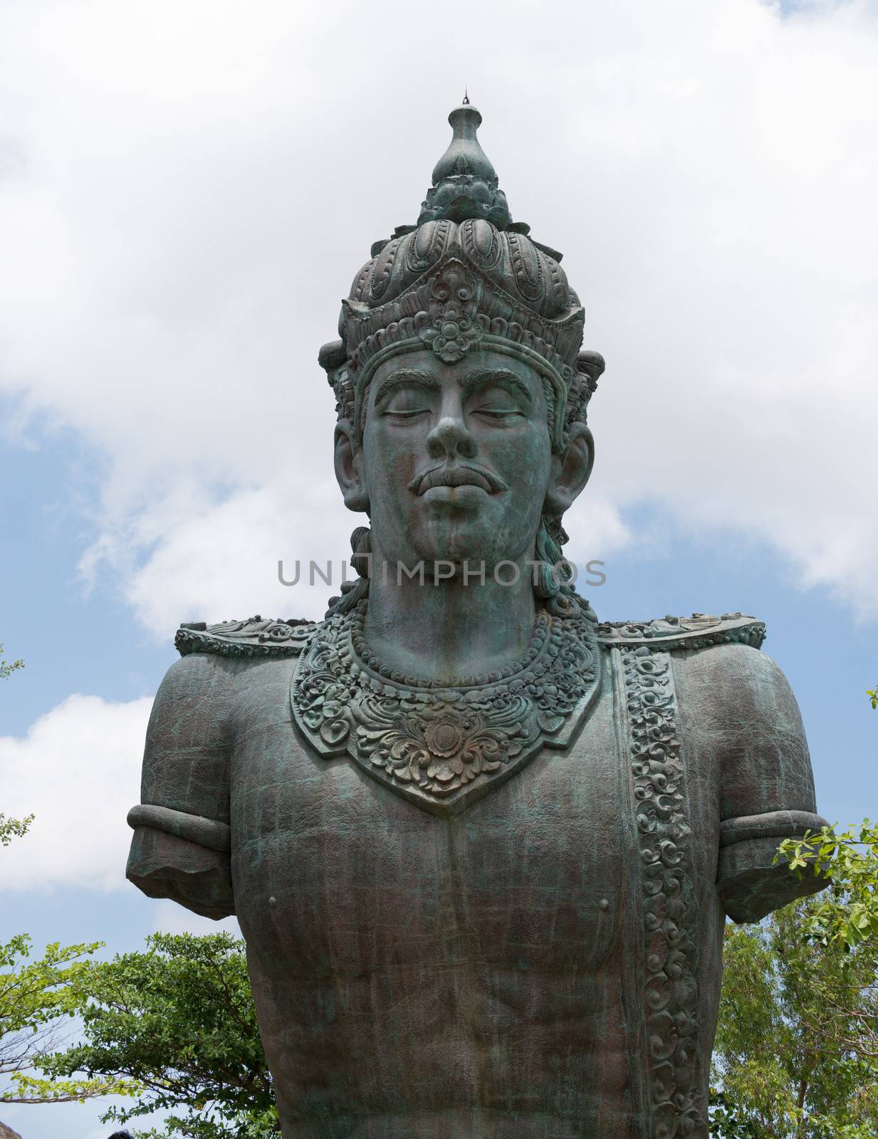 BALI, INDONESIA - SEP 13: Wishnu hindu god statue in GWK culture park on Sep 13 in Bali, Indonesia. Garuda Wisnu Kencana Cultural Park in popular touristi attraction since 2011. 