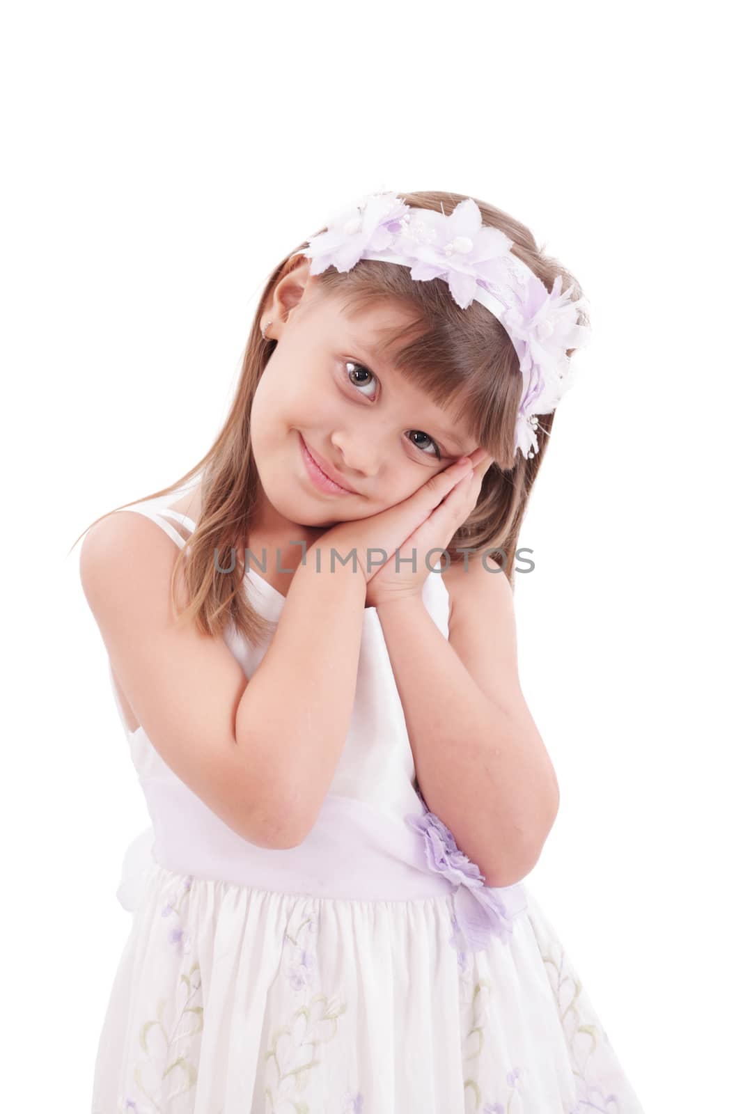 happy smiling little girl on white background in studio by dacasdo