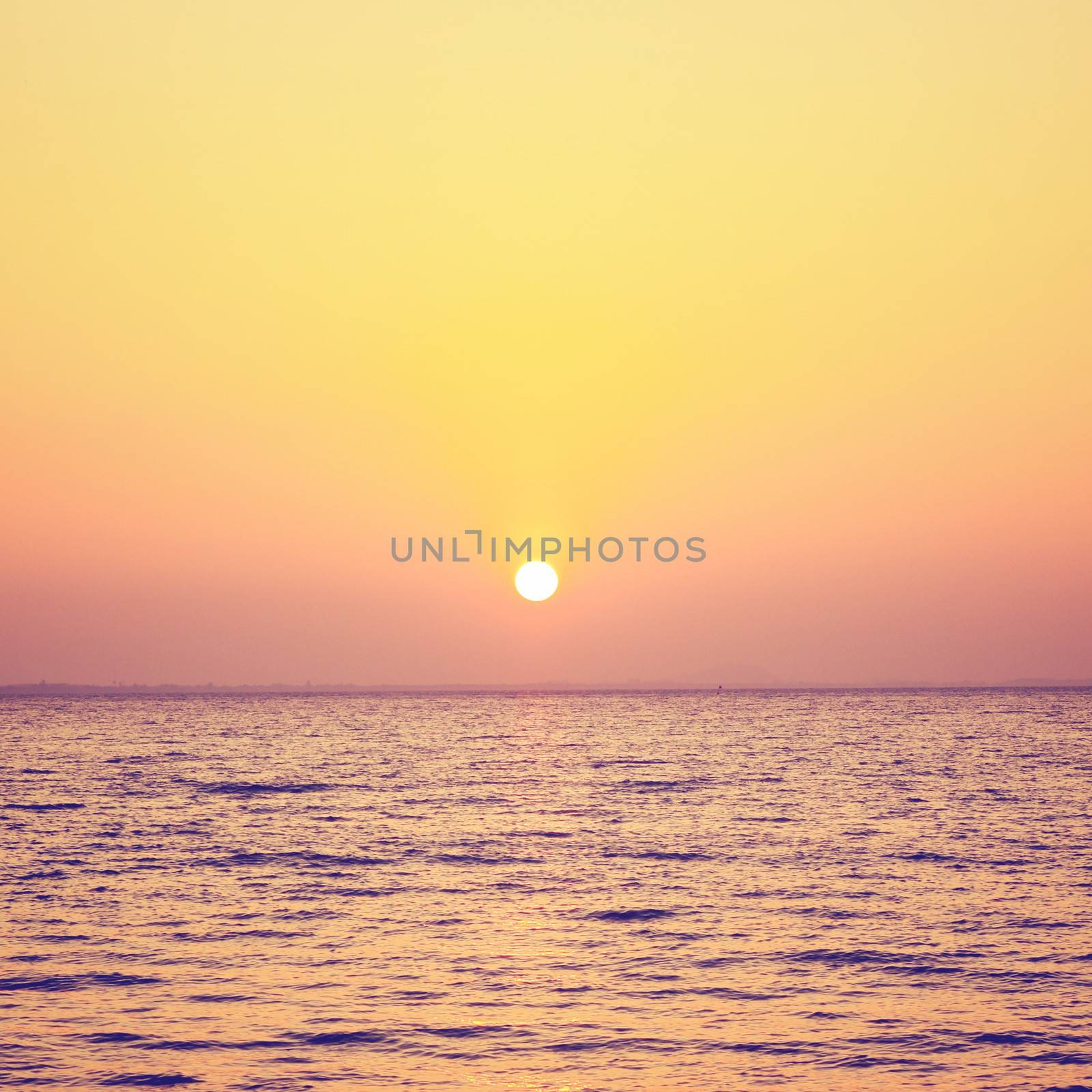 Sunrise over the sea with retro filter effect by nuchylee