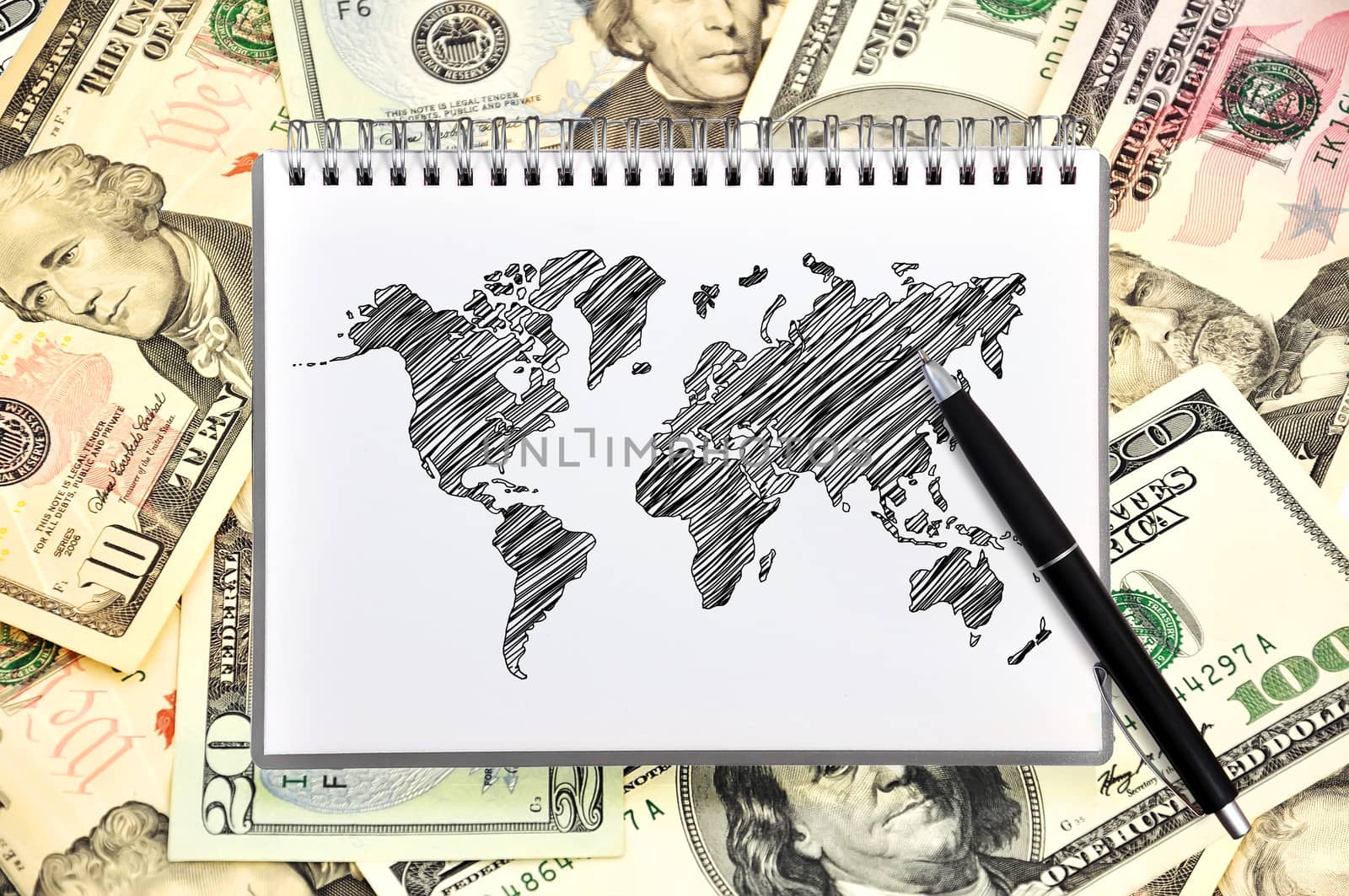 note book with map on background of dollars