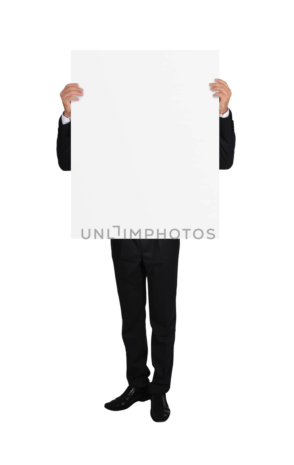 businessman in tuxedo holding blank placard