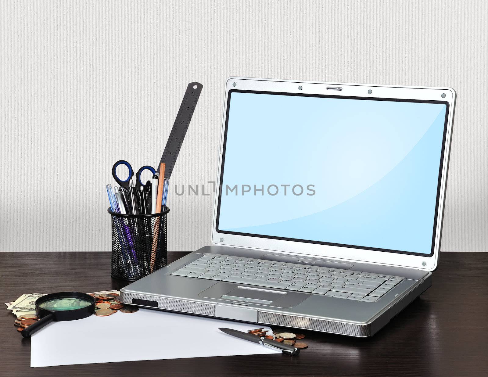 notebook with stationery and money on table